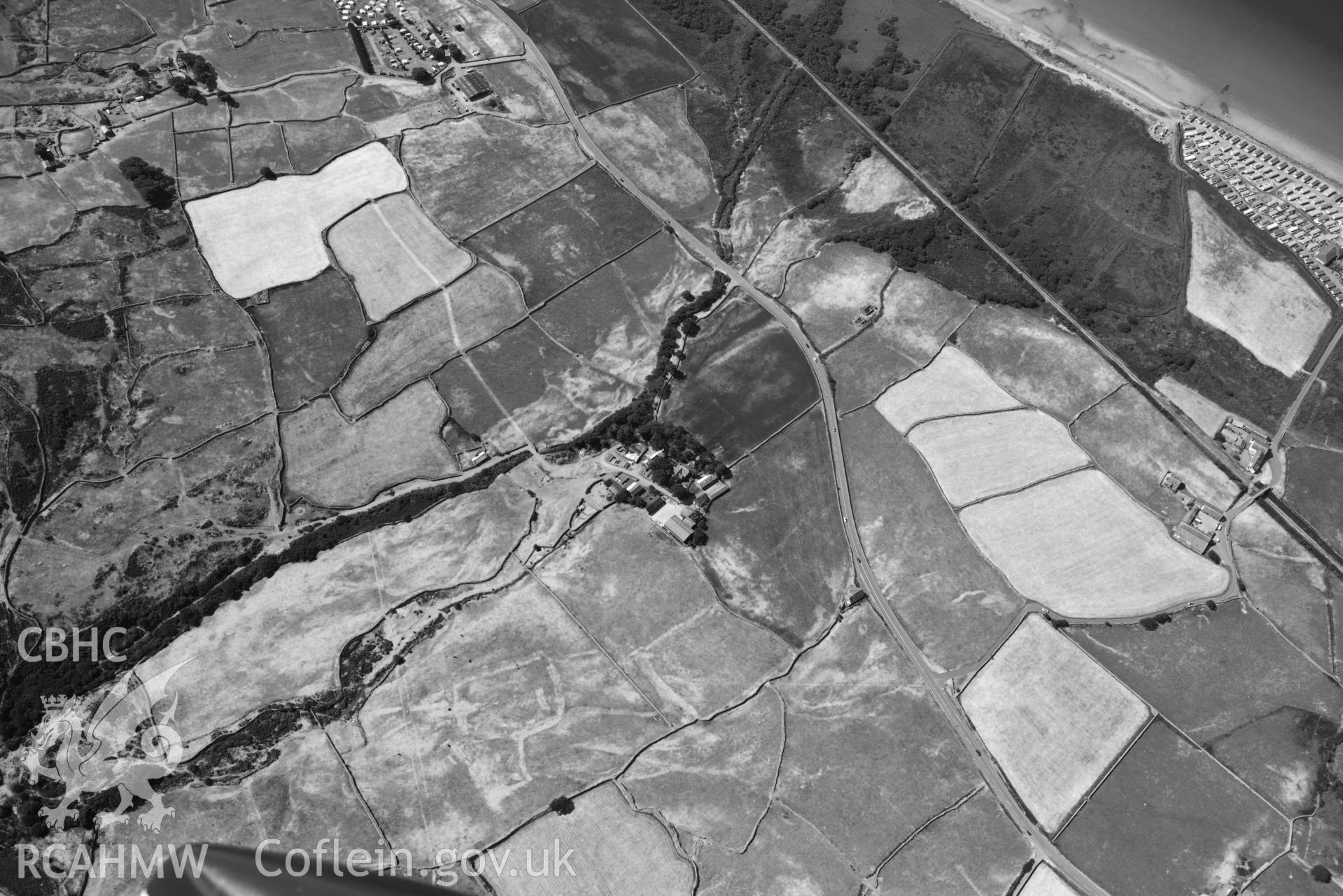 Aerial photograph: Egryn Abbey, with parchmarks of former fields. Crown: CHERISH PROJECT 2018. Produced with EU funds through the Ireland Wales Co-operation Programme 2014-2020 (NGR: SH595203)