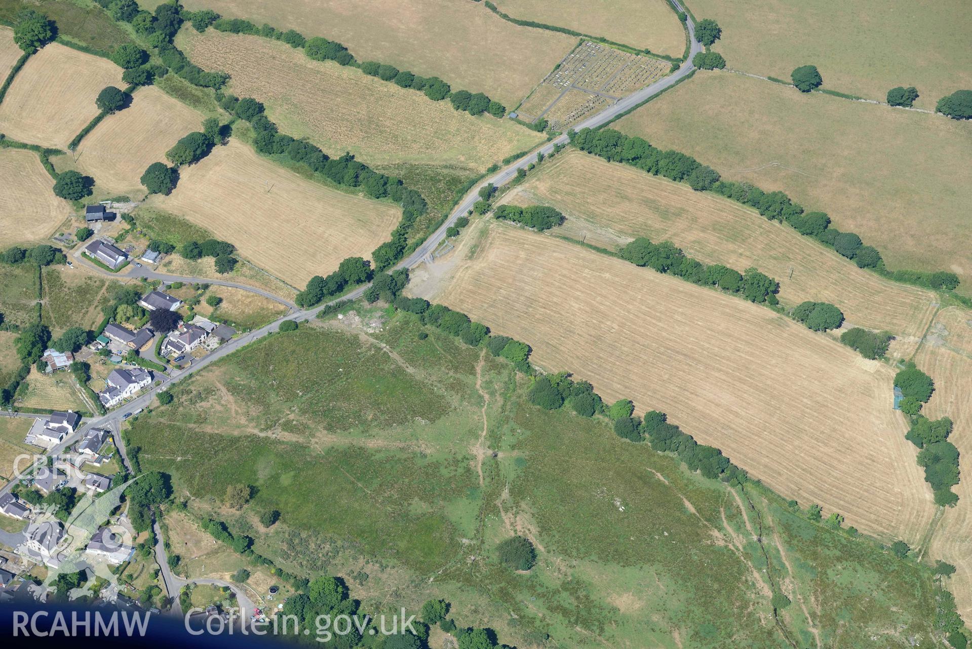 Aerial photograph: Roman road passing through Rhos Isaf. Earthwork agger on common land. Crown: CHERISH PROJECT 2018. Produced with EU funds through the Ireland Wales Co-operation Programme 2014-2020 (NGR: SH486580)