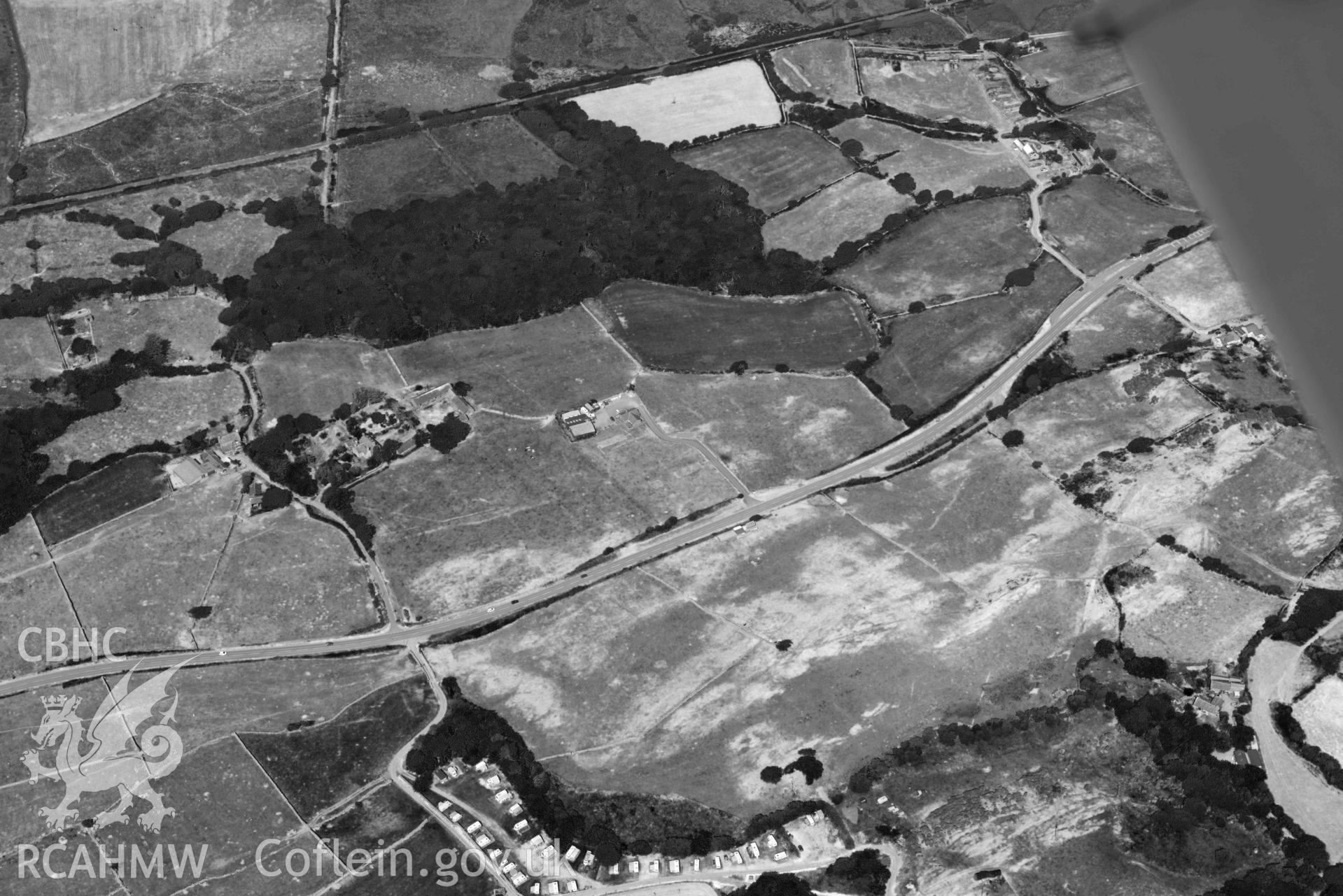 Aerial photograph: Tal-Treiddyn-fawr, garden with parchmarks of World War Two airfield buildings. Crown: CHERISH PROJECT 2018. Produced with EU funds through the Ireland Wales Co-operation Programme 2014-2020 (NGR: SH582256)