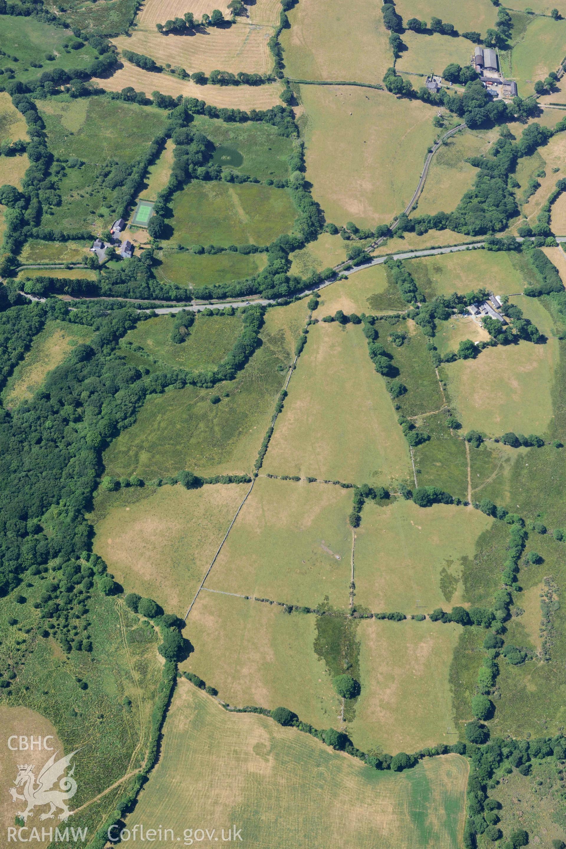 Aerial photograph: Roman road passing through Rhos Isaf. Parchmarks at Dolau Gwyn. Crown: CHERISH PROJECT 2018. Produced with EU funds through the Ireland Wales Co-operation Programme 2014-2020 (NGR: SH489586)