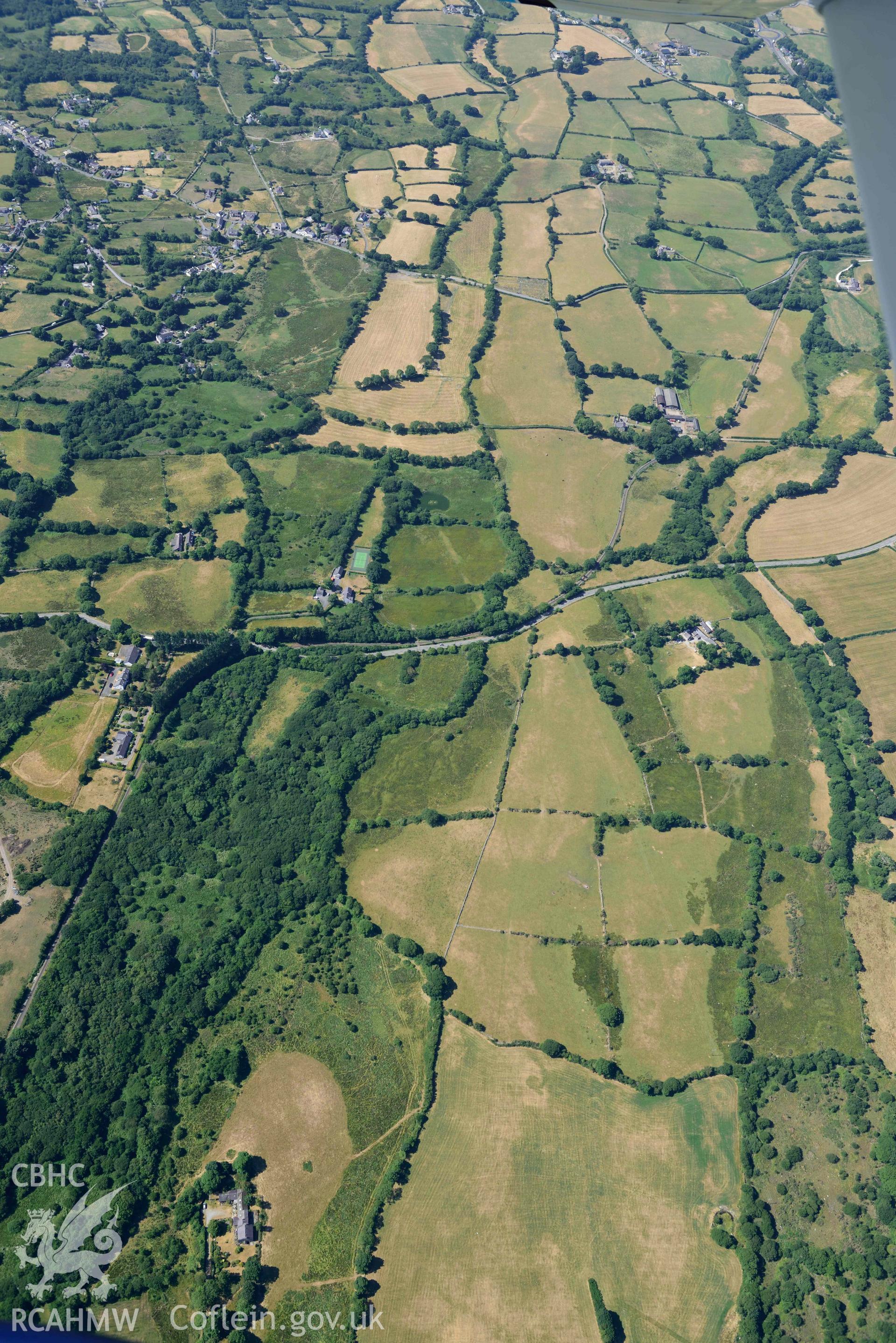 Aerial photograph: Roman road passing through Rhos Isaf. Parchmarks at Dolau Gwyn. Crown: CHERISH PROJECT 2018. Produced with EU funds through the Ireland Wales Co-operation Programme 2014-2020 (NGR: SH489586)