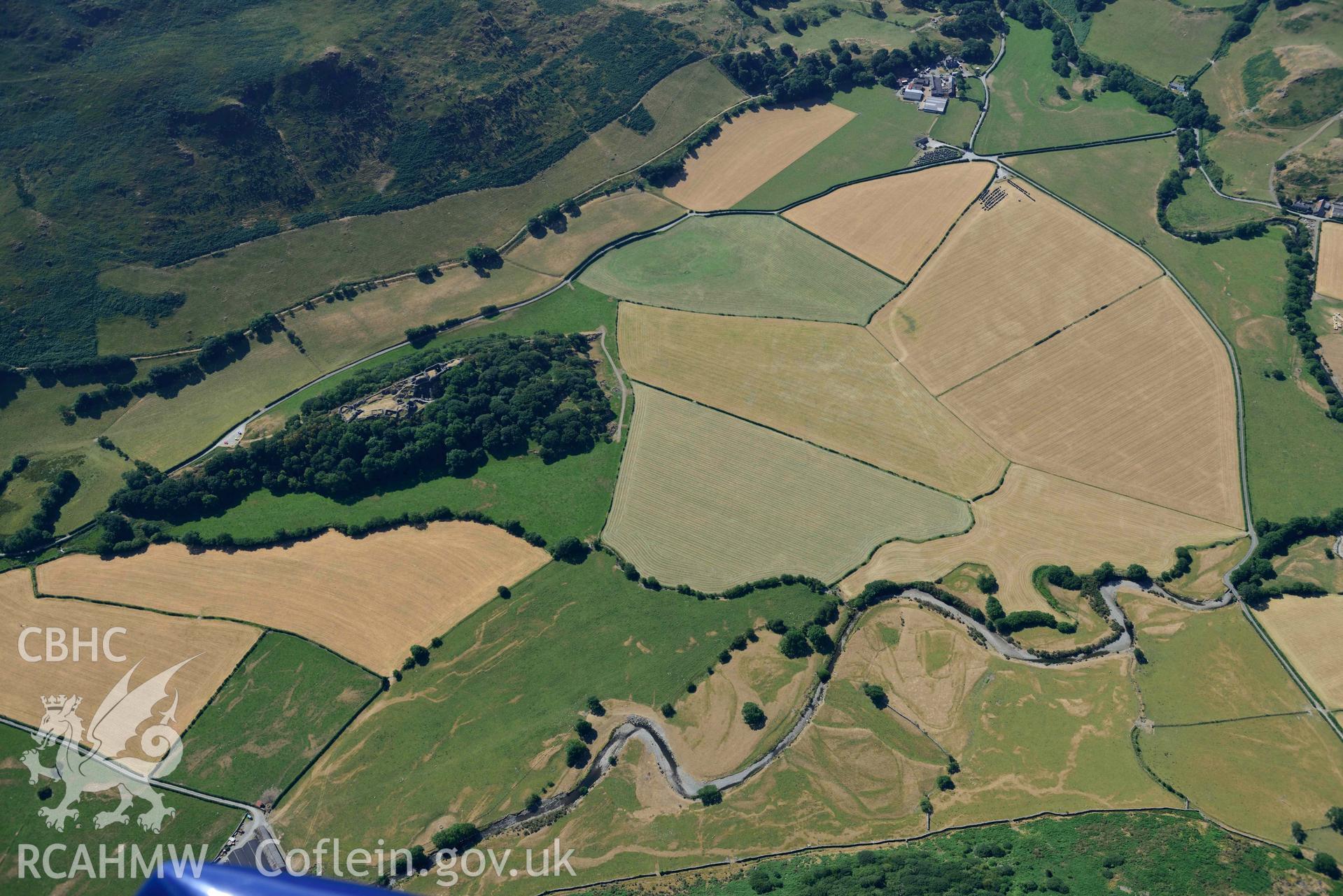 Aerial photograph: Castell y Bere, castle. Wide landscape view with riverine parchmarks. Crown: CHERISH PROJECT 2018. Produced with EU funds through the Ireland Wales Co-operation Programme 2014-2020 (NGR: SH667085)