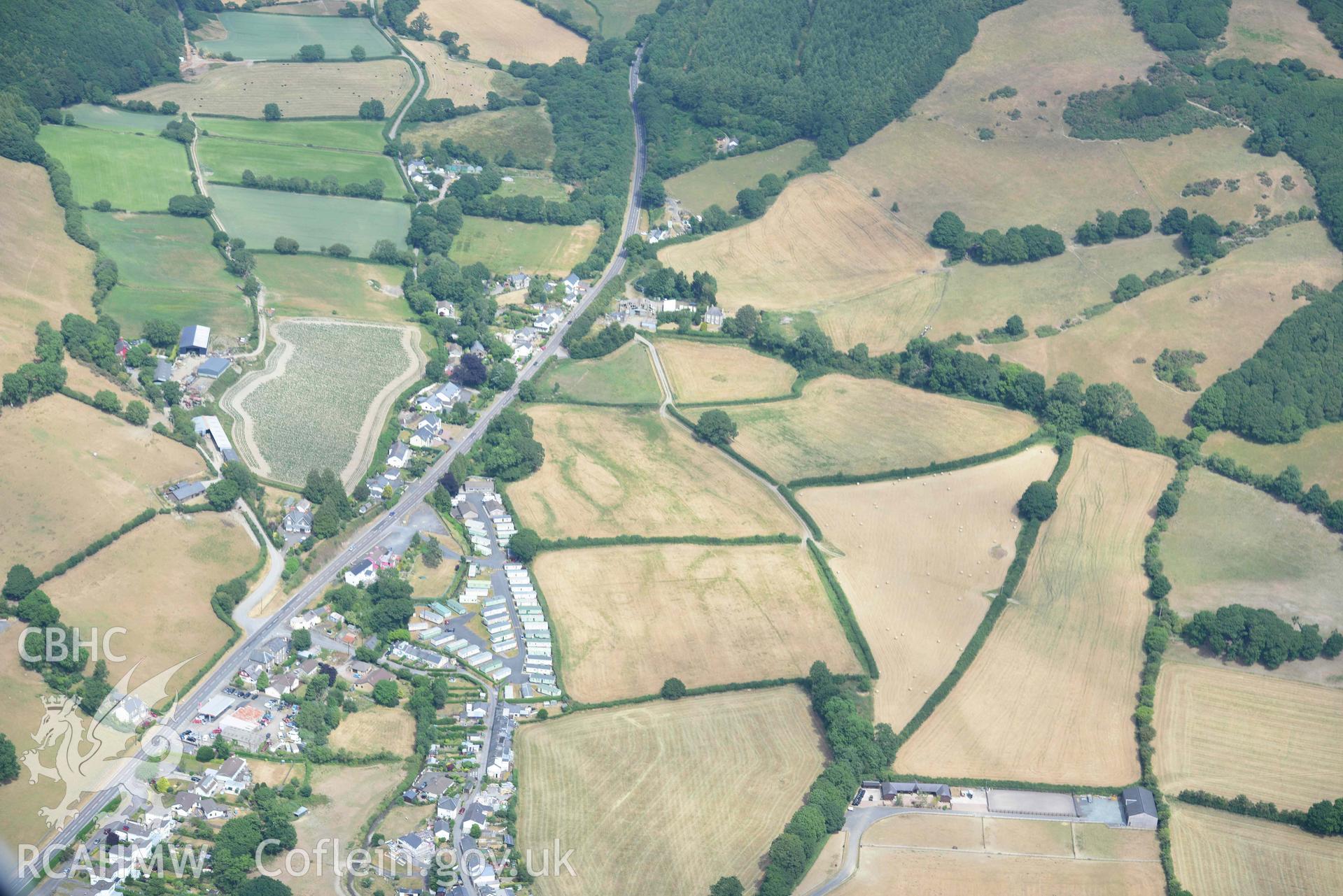 Aerial photograph: Dolypandy round barrow cropmarks, view looking east. Crown: CHERISH PROJECT 2018. Produced with EU funds through the Ireland Wales Co-operation Programme 2014-2020 (NGR SN662800)