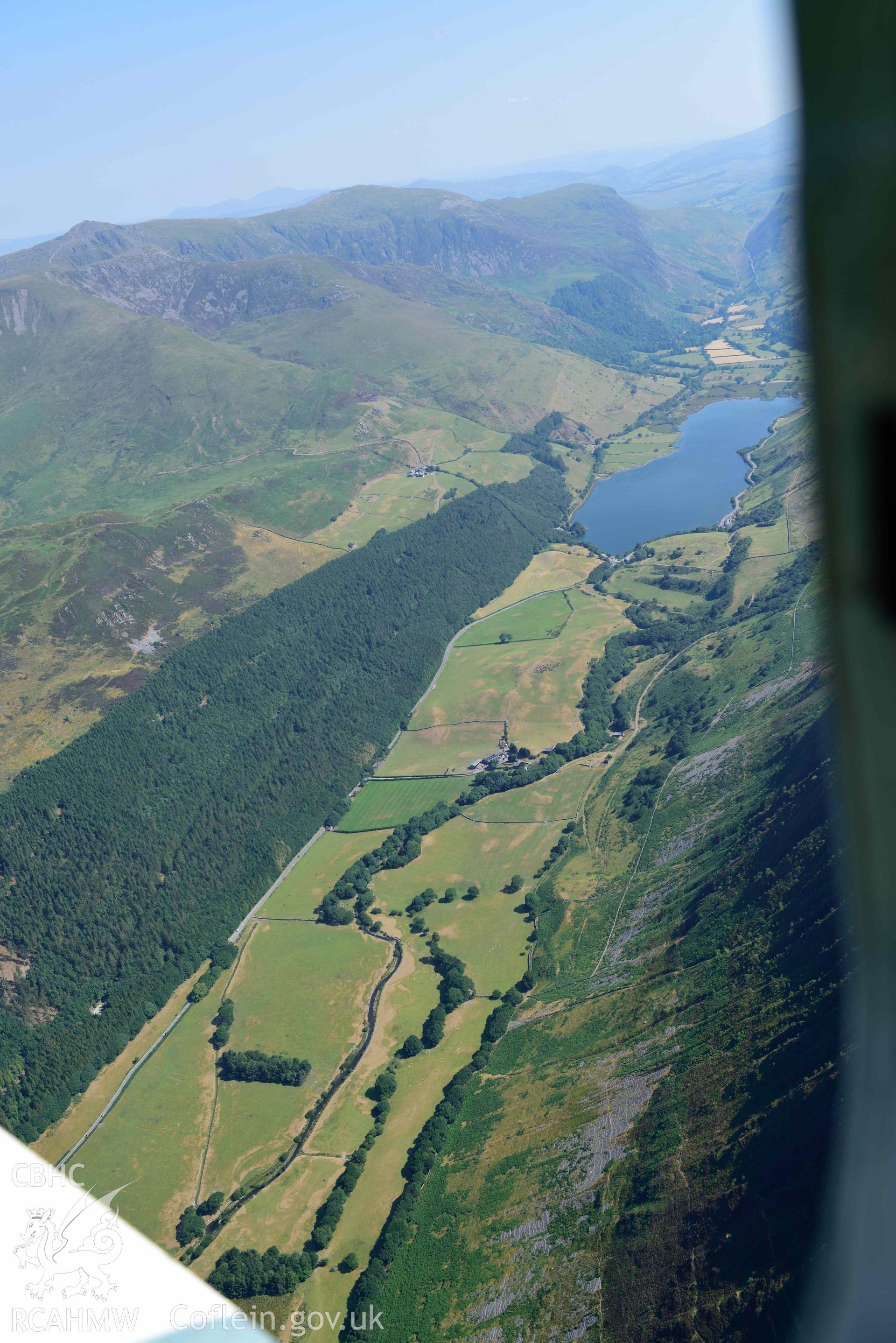 Aerial photograph: Tal-y-llyn Lake, view from southwest. Crown: CHERISH PROJECT 2018. Produced with EU funds through the Ireland Wales Co-operation Programme 2014-2020 (NGR: SH713096)