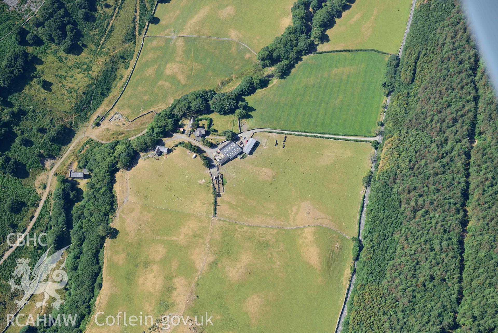 Aerial photograph: Maes y Pandy, cropmarks of quarry pits and trackways. Crown: CHERISH PROJECT 2018. Produced with EU funds through the Ireland Wales Co-operation Programme 2014-2020 (NGR: SH703087)