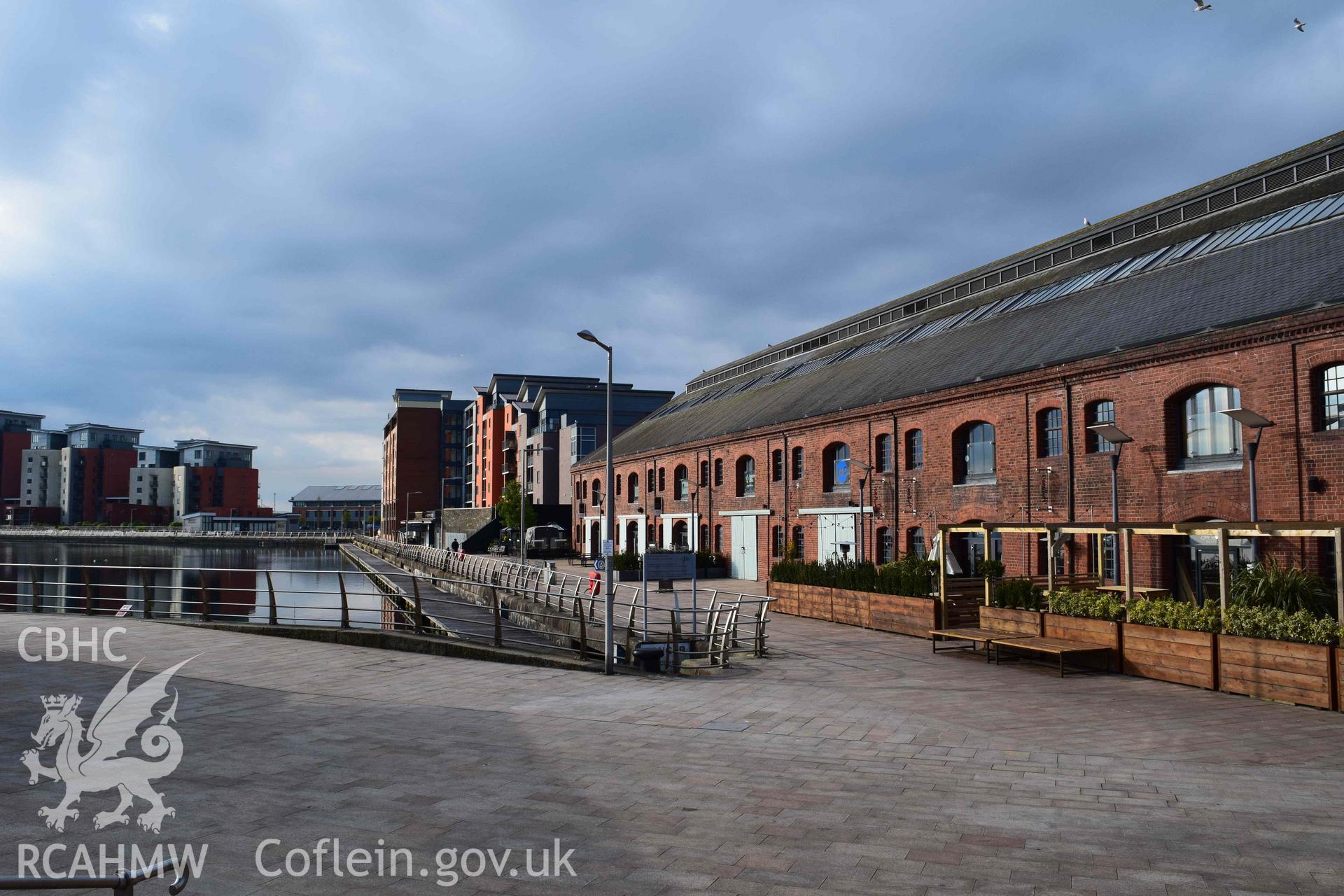 Photograph from an assessment of heritage impact on the setting of the J Shed Listed Building of seating at the Rasoi Waterfront restaurant, Waterfront, Swansea, carried out by Trysor in 2021. Trysor Project No. 2021/783.