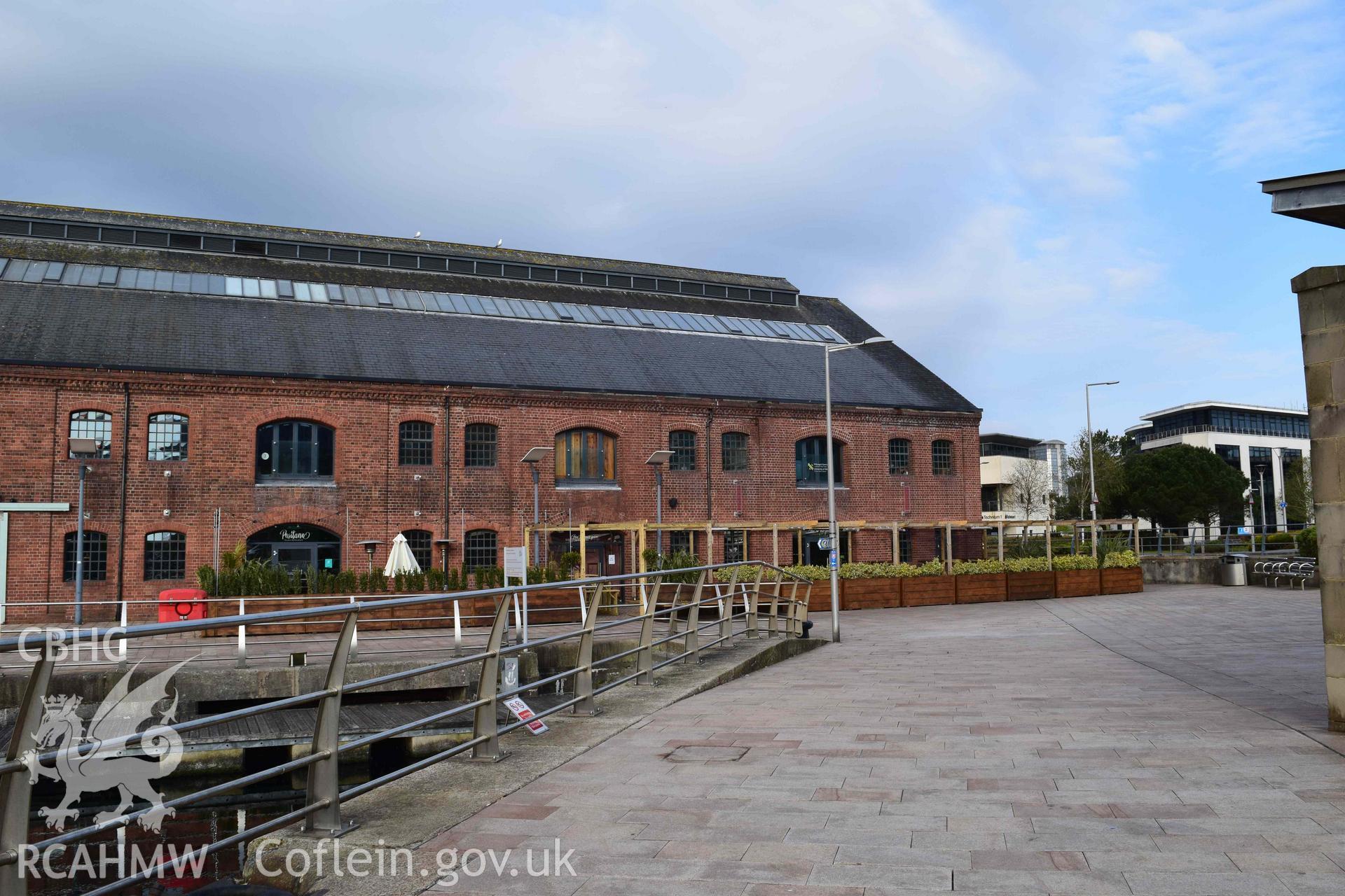 Photograph from an assessment of heritage impact on the setting of the J Shed Listed Building of seating at the Rasoi Waterfront restaurant, Waterfront, Swansea, carried out by Trysor in 2021. Trysor Project No. 2021/783.