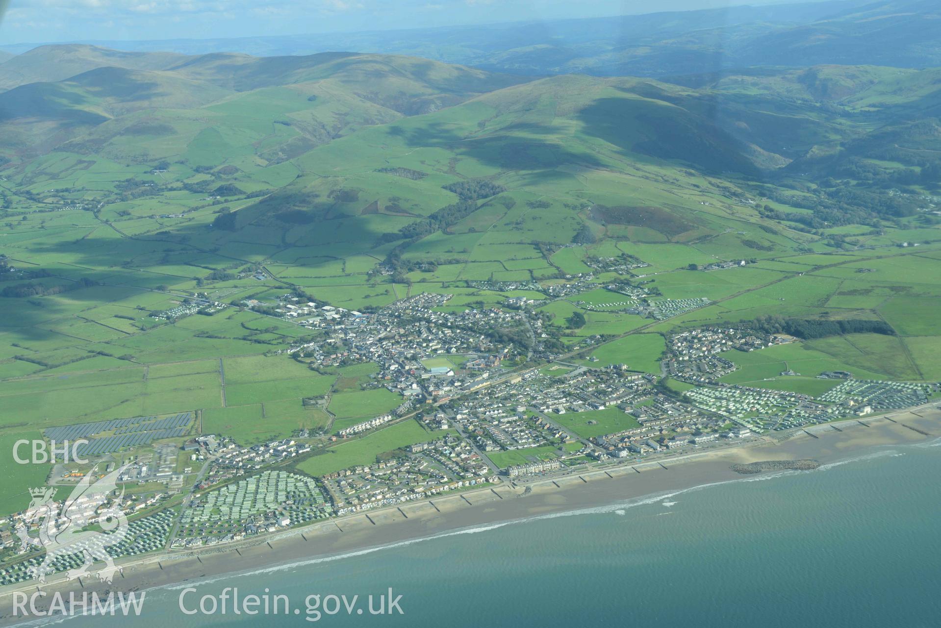 Tywyn, town, view through perspex window of aircraft