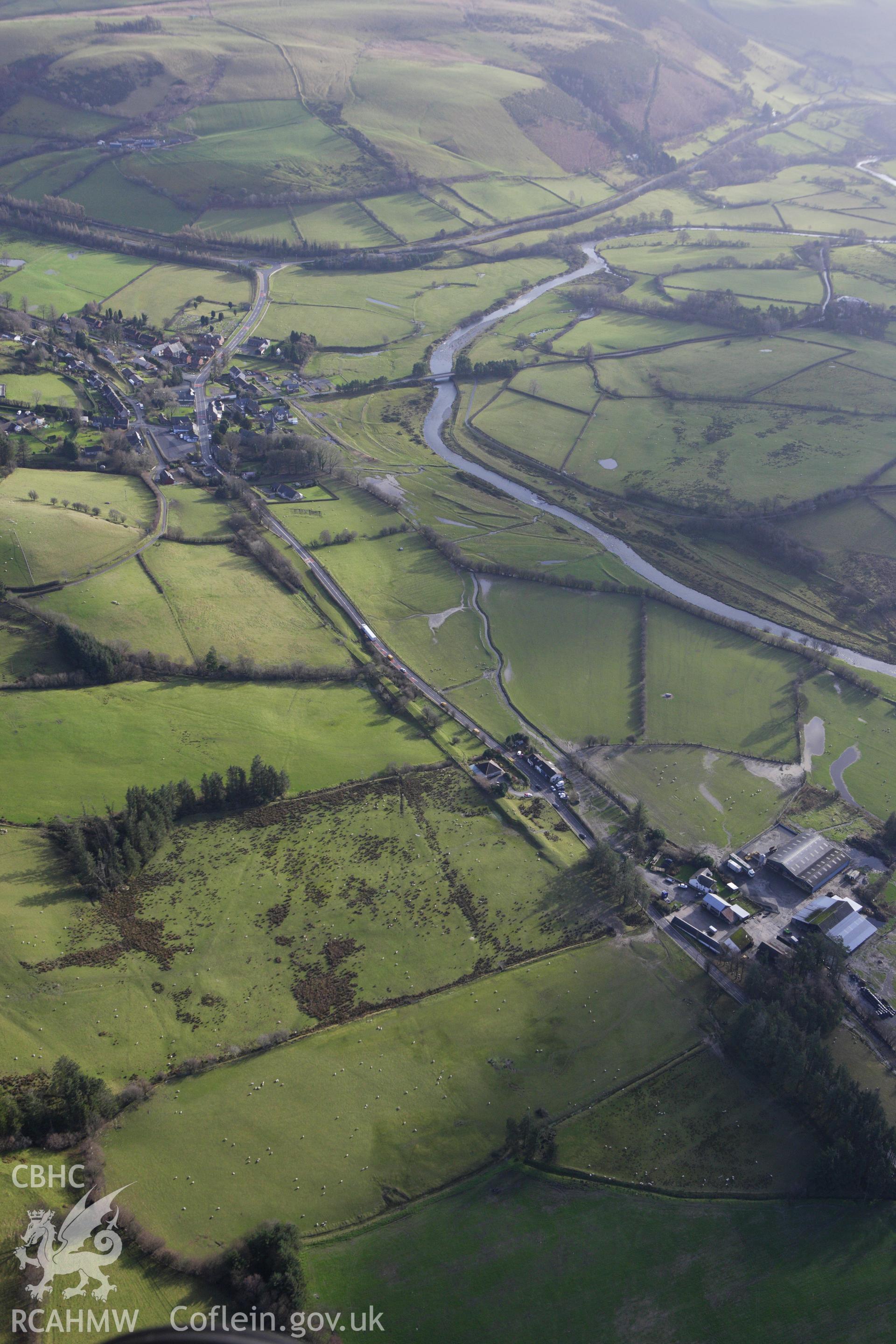 RCAHMW colour oblique aerial photograph of a section of the dismantled Manchester and Milford Railway between Llangurig and Llanidloes west of Llangurig. Taken on 10 December 2009 by Toby Driver