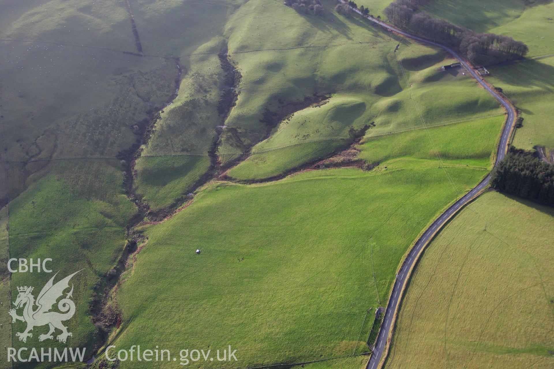 RCAHMW colour oblique aerial photograph of Double Ditches Dyke, Kerry. Taken on 10 December 2009 by Toby Driver