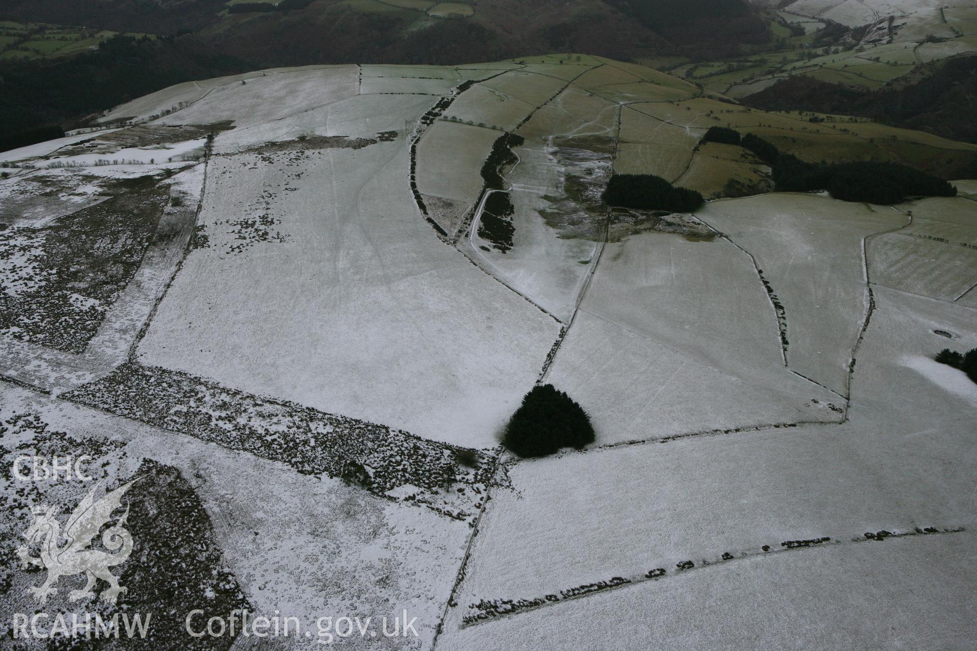 RCAHMW colour oblique photograph of Tomen-y-Gwyddel. Taken by Toby Driver on 21/01/2009.