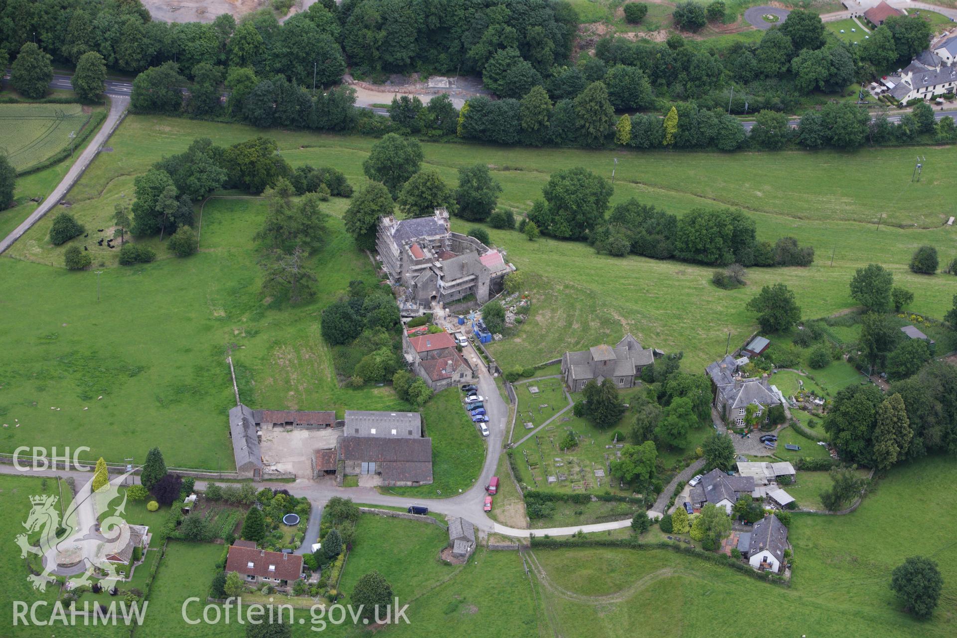 RCAHMW colour oblique aerial photograph of Penhow Castle. Taken on 09 July 2009 by Toby Driver