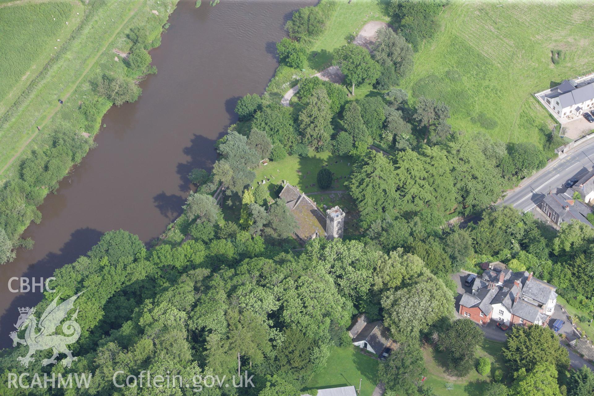 RCAHMW colour oblique aerial photograph of St Madog's Church, Llanbadoc Fawr. Taken on 11 June 2009 by Toby Driver