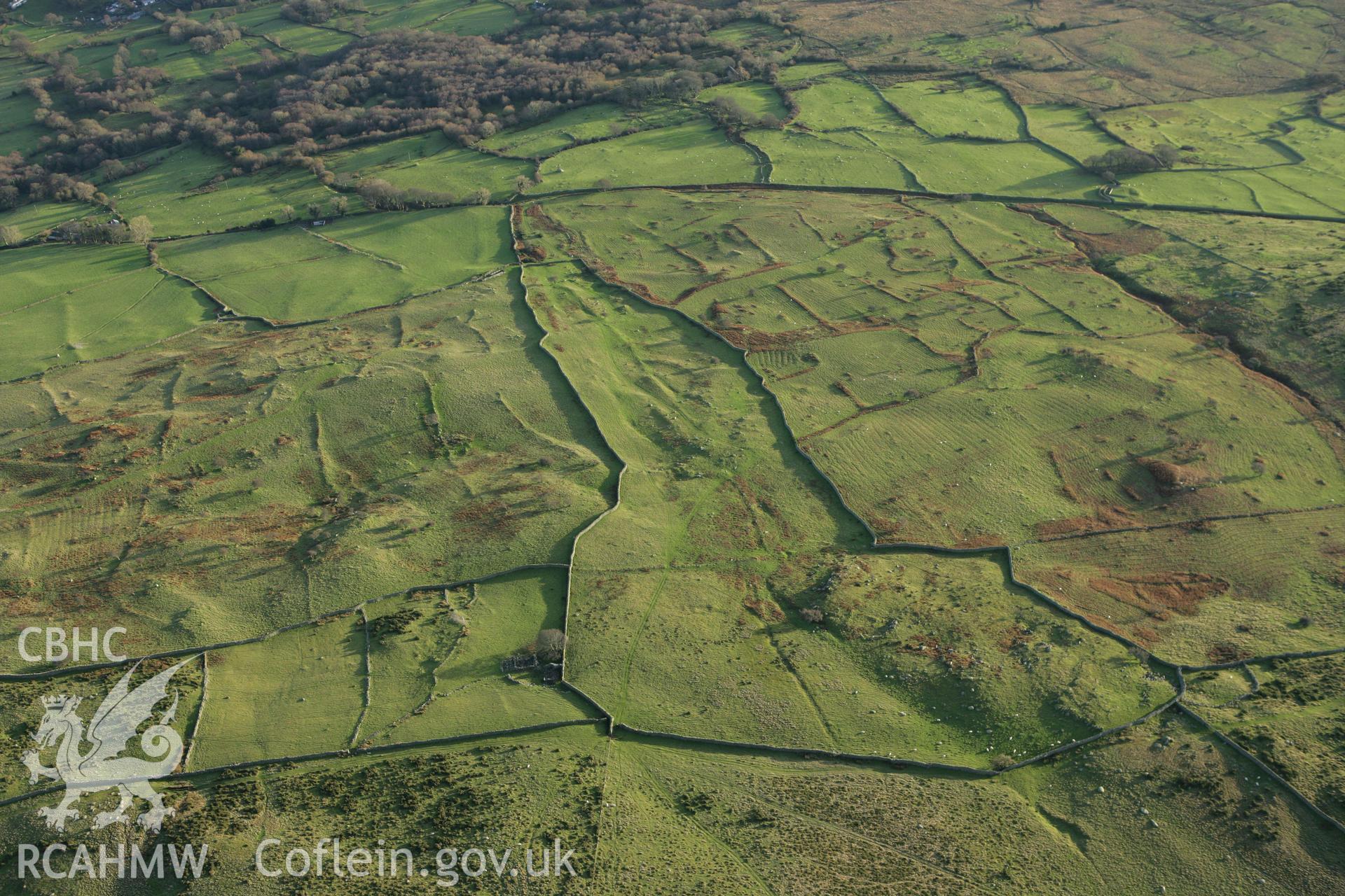 RCAHMW colour oblique aerial photograph of Maen-y-Bardd Settlement and field systems Taken on 10 December 2009 by Toby Driver