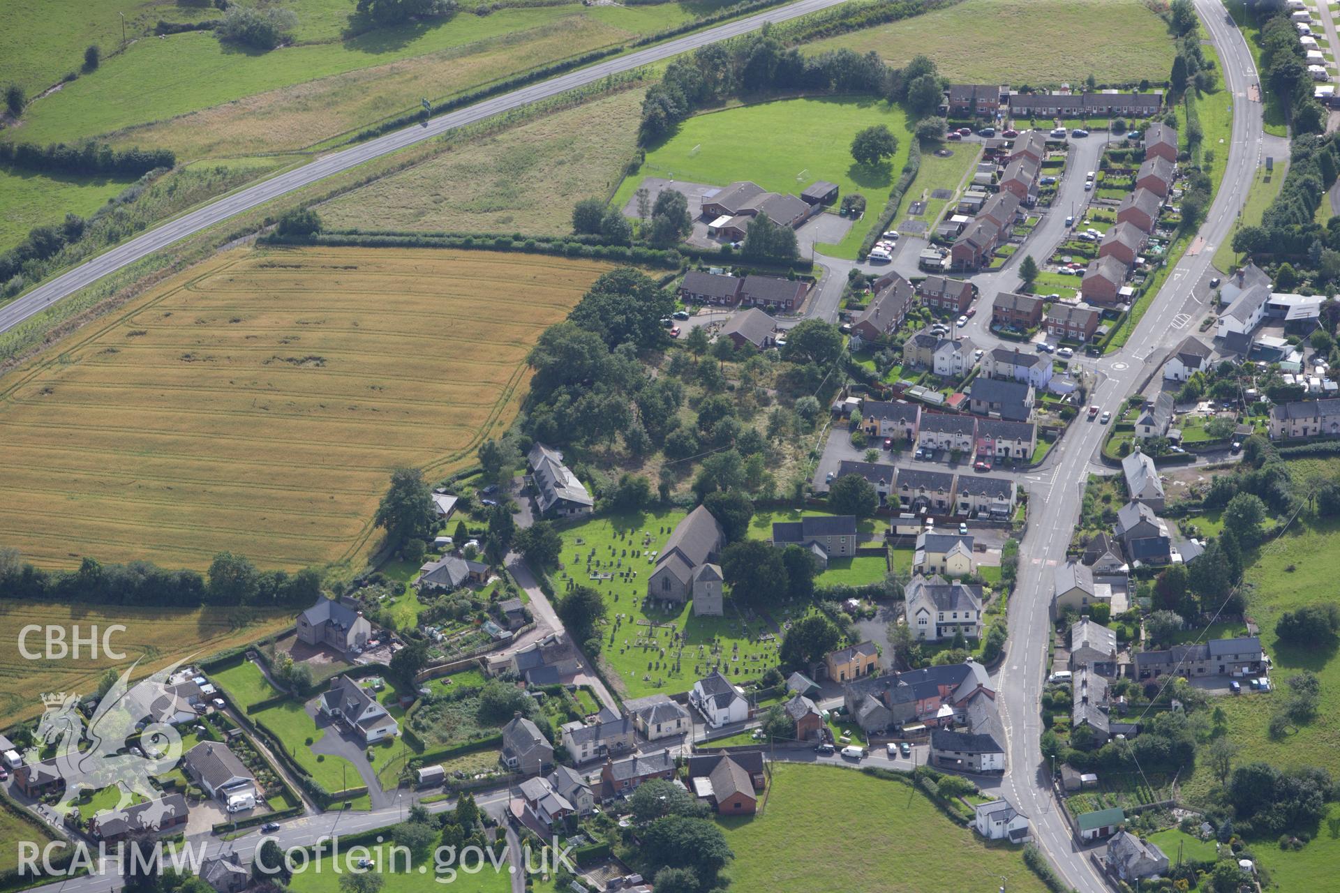 RCAHMW colour oblique aerial photograph of Bronllys Moat. Taken on 23 July 2009 by Toby Driver