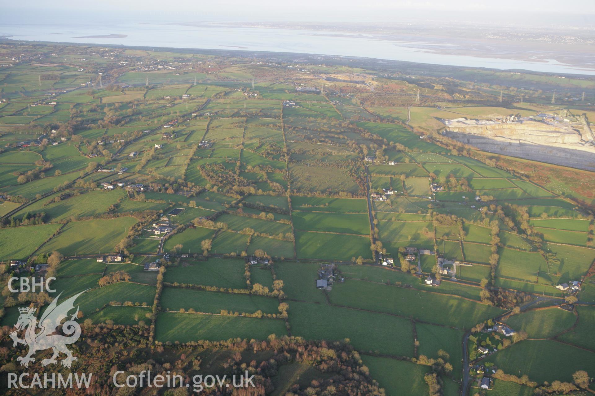 RCAHMW colour oblique aerial photograph of Parc-y-Prysau Round Barrow II, in view of landscape of Pen Uchar Plwyf. Taken on 10 December 2009 by Toby Driver