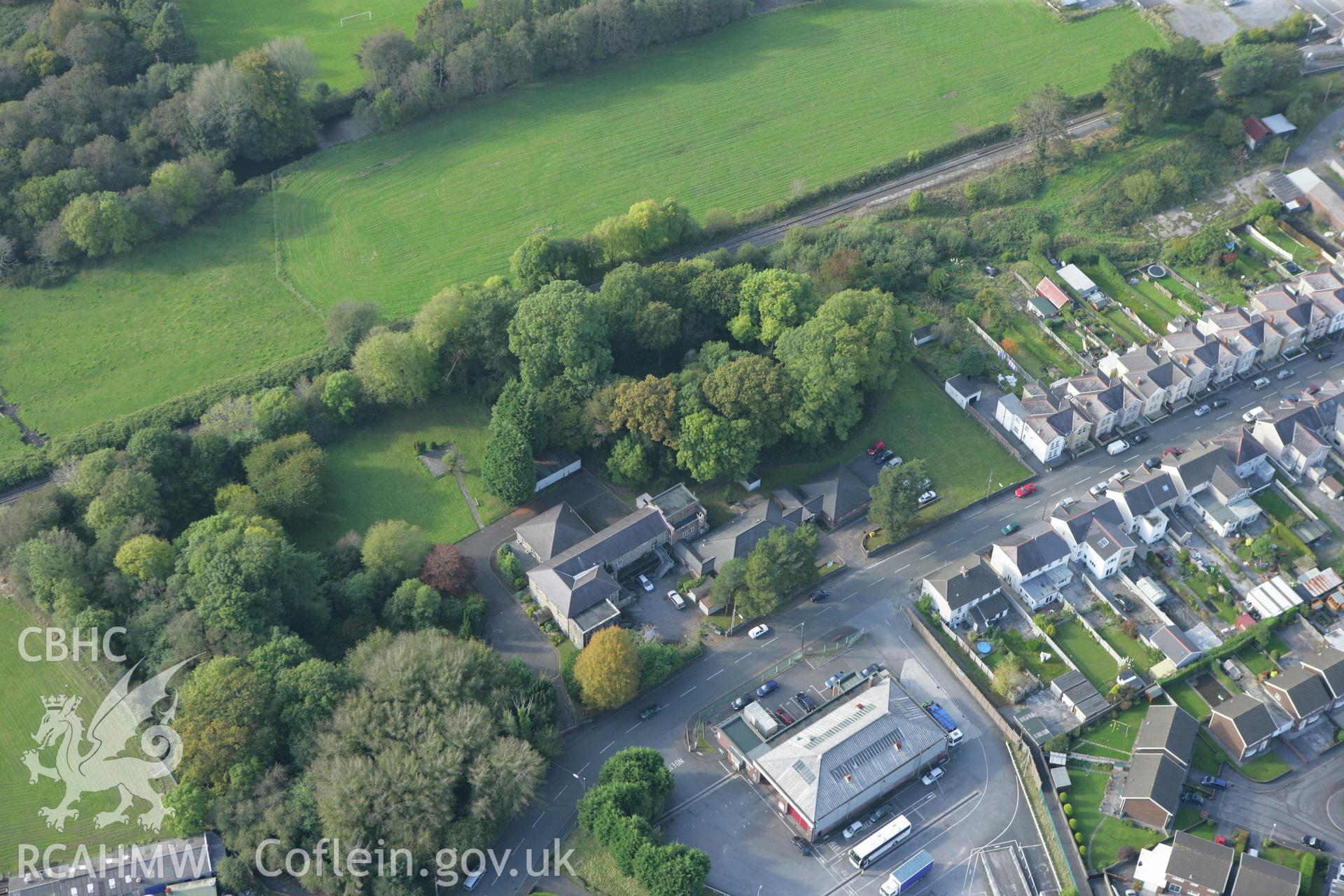 RCAHMW colour oblique aerial photograph of Tir-y-Dail Motte and Bailey, Ammanford, Rhydaman. Taken on 14 October 2009 by Toby Driver