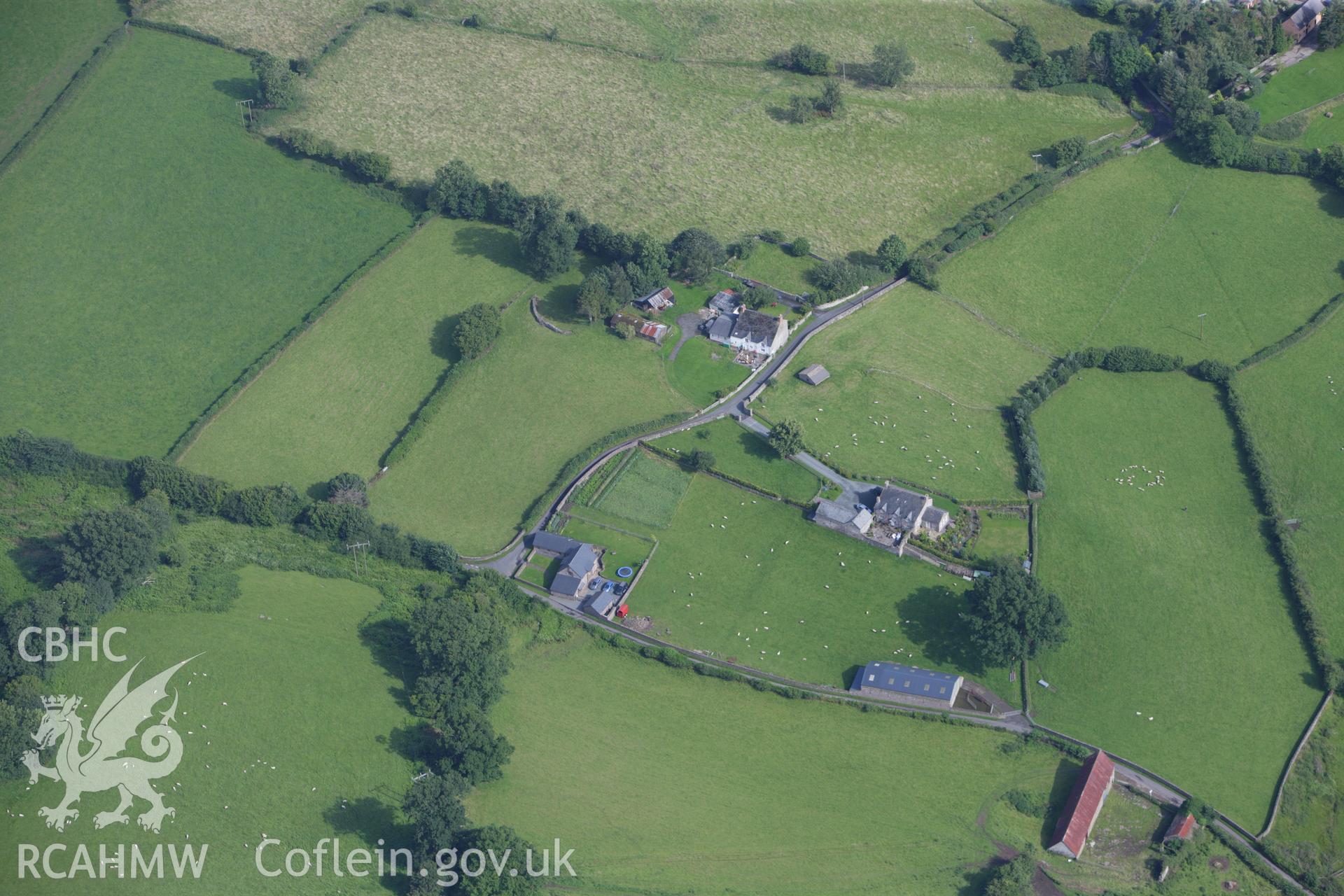 RCAHMW colour oblique aerial photograph of Castell Madoc Ringwork. Taken on 23 July 2009 by Toby Driver