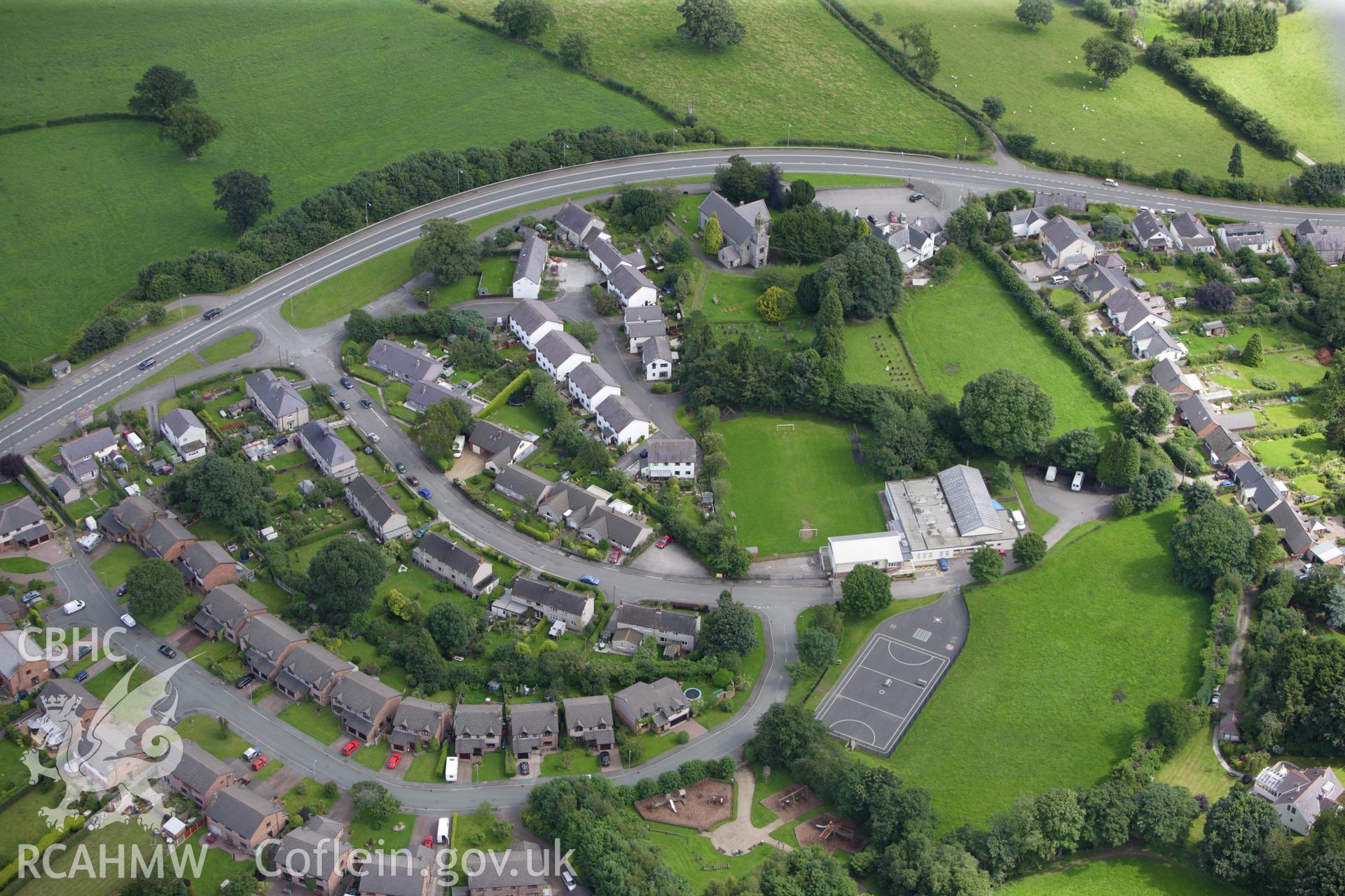 RCAHMW colour oblique aerial photograph of Llanferres village. Taken on 30 July 2009 by Toby Driver