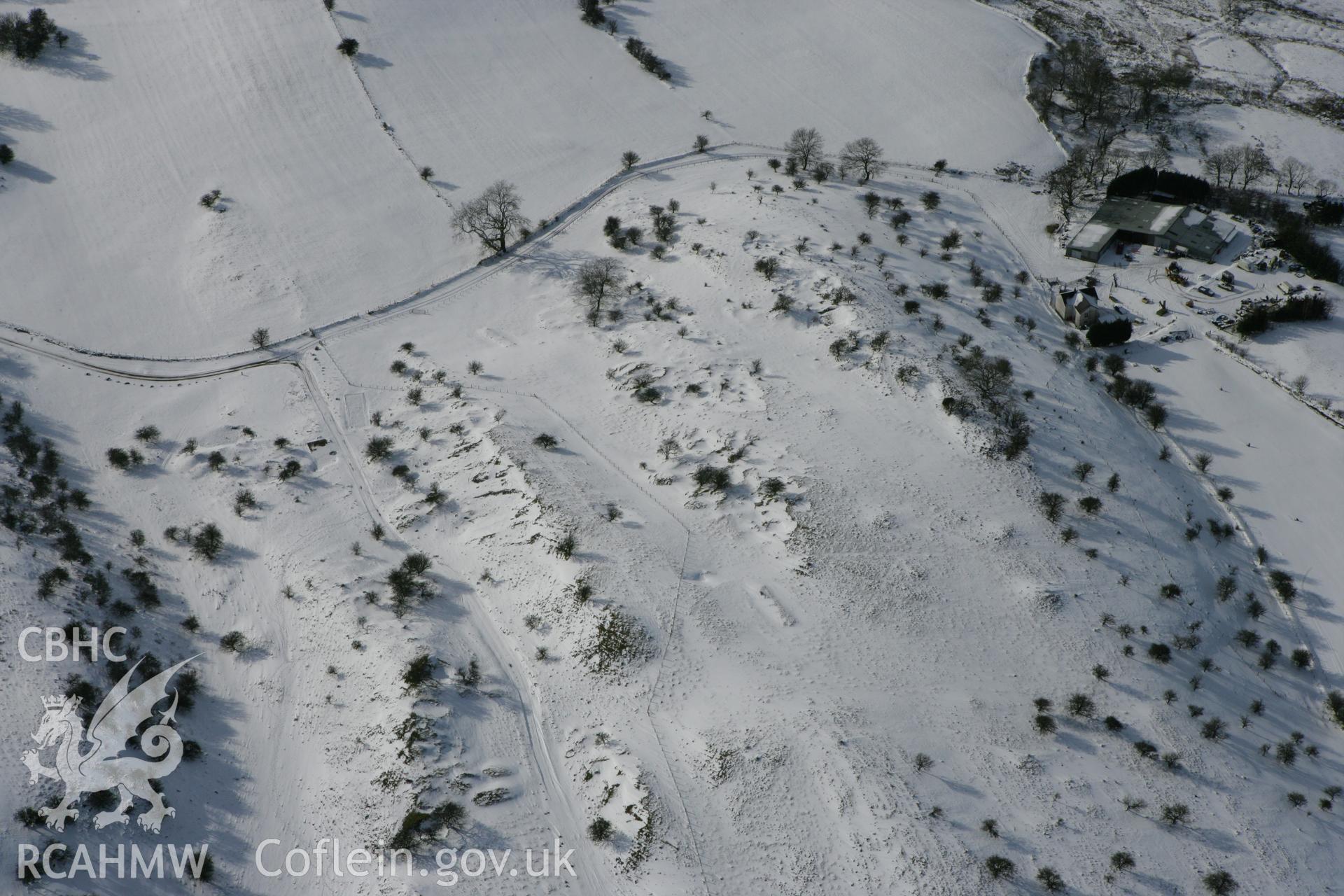 RCAHMW colour oblique photograph of Beddau'r Derwyddon pillow mounds. Taken by Toby Driver on 06/02/2009.