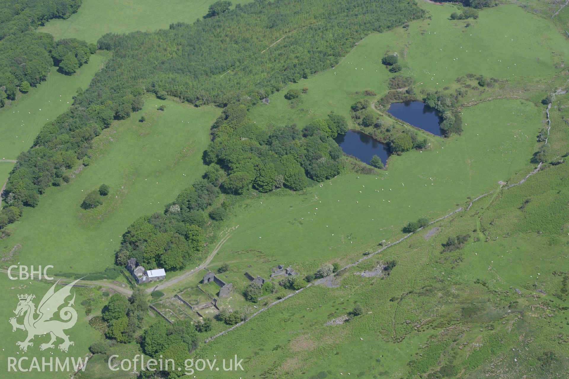 RCAHMW colour oblique aerial photograph of Bryndyfi Lead Mine, Eglwysfach. Taken on 02 June 2009 by Toby Driver