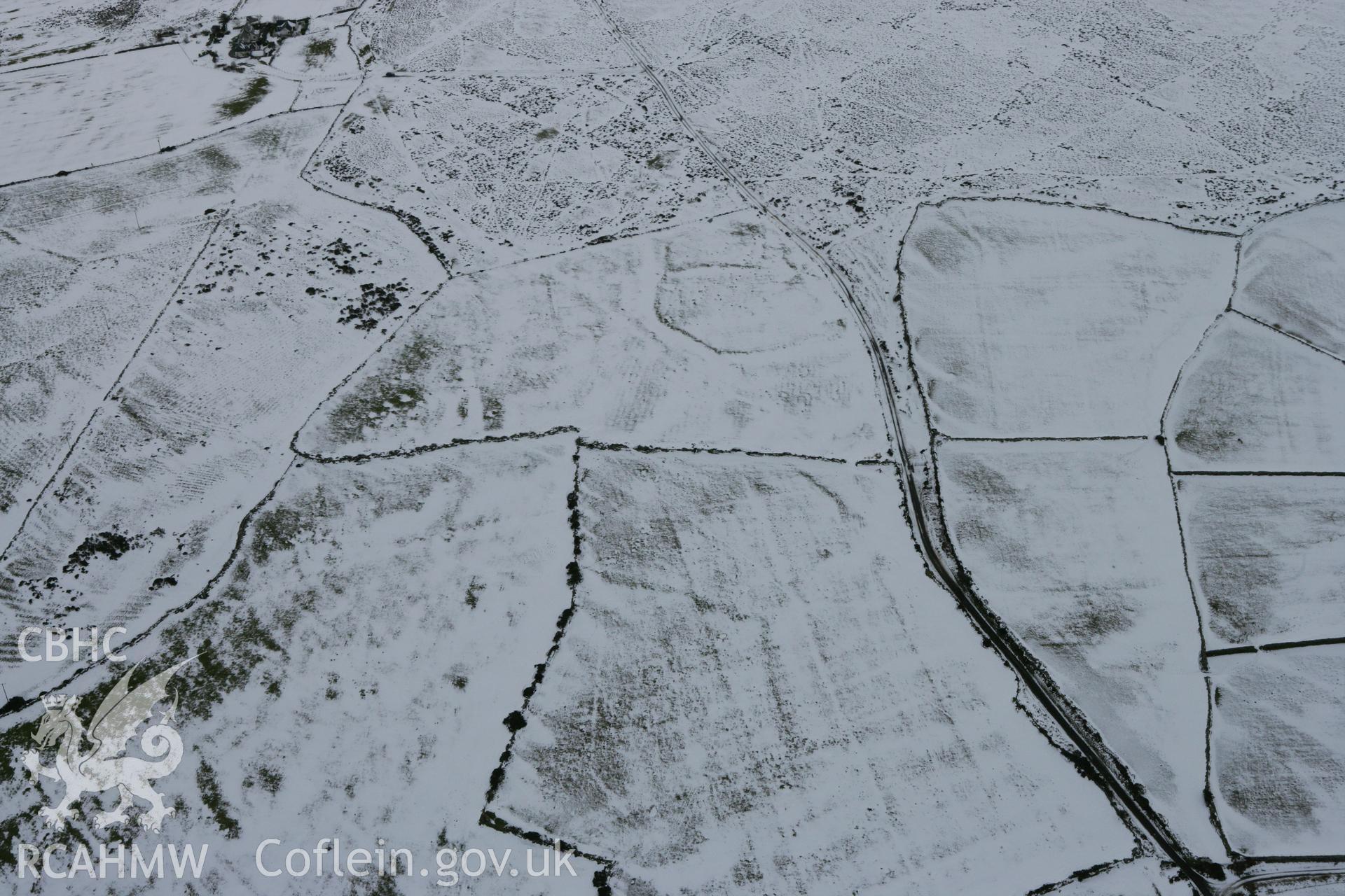 RCAHMW colour oblique photograph of Circular enclosure, SE of Dinas Cross. Taken by Toby Driver on 06/02/2009.