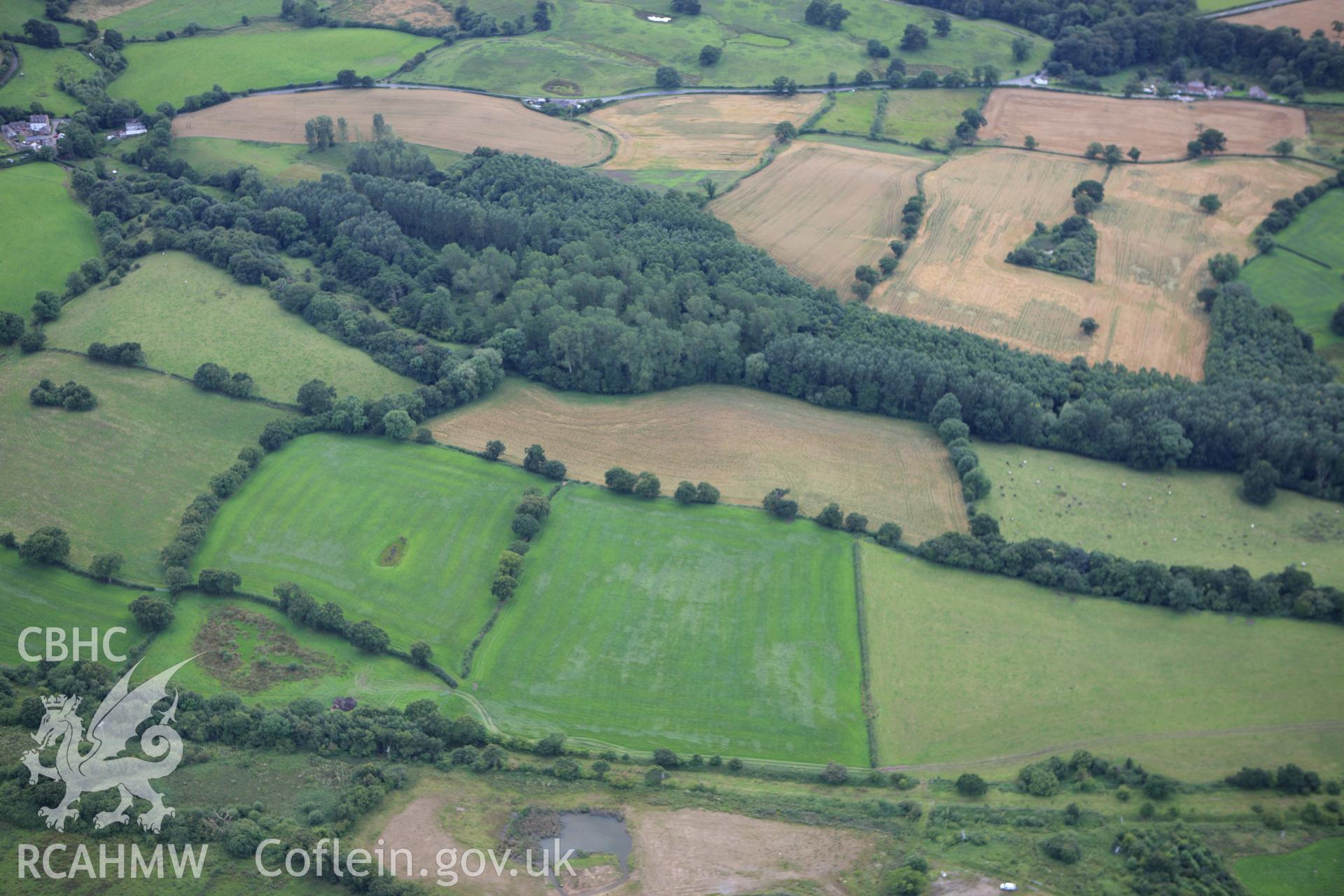 RCAHMW colour oblique aerial photograph of Wat's Dyke west of Rhos-y-Brwyner. Taken on 30 July 2009 by Toby Driver