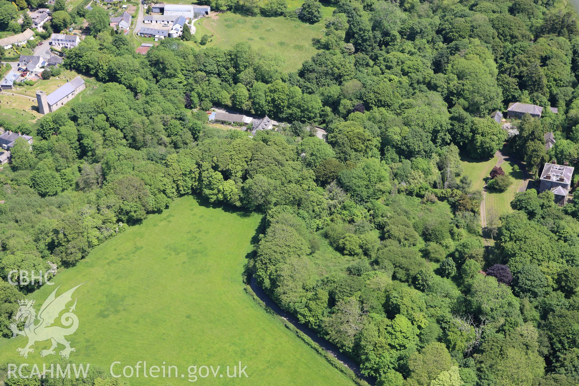 RCAHMW colour oblique aerial photograph of Camros Castle. Taken on 01 June 2009 by Toby Driver