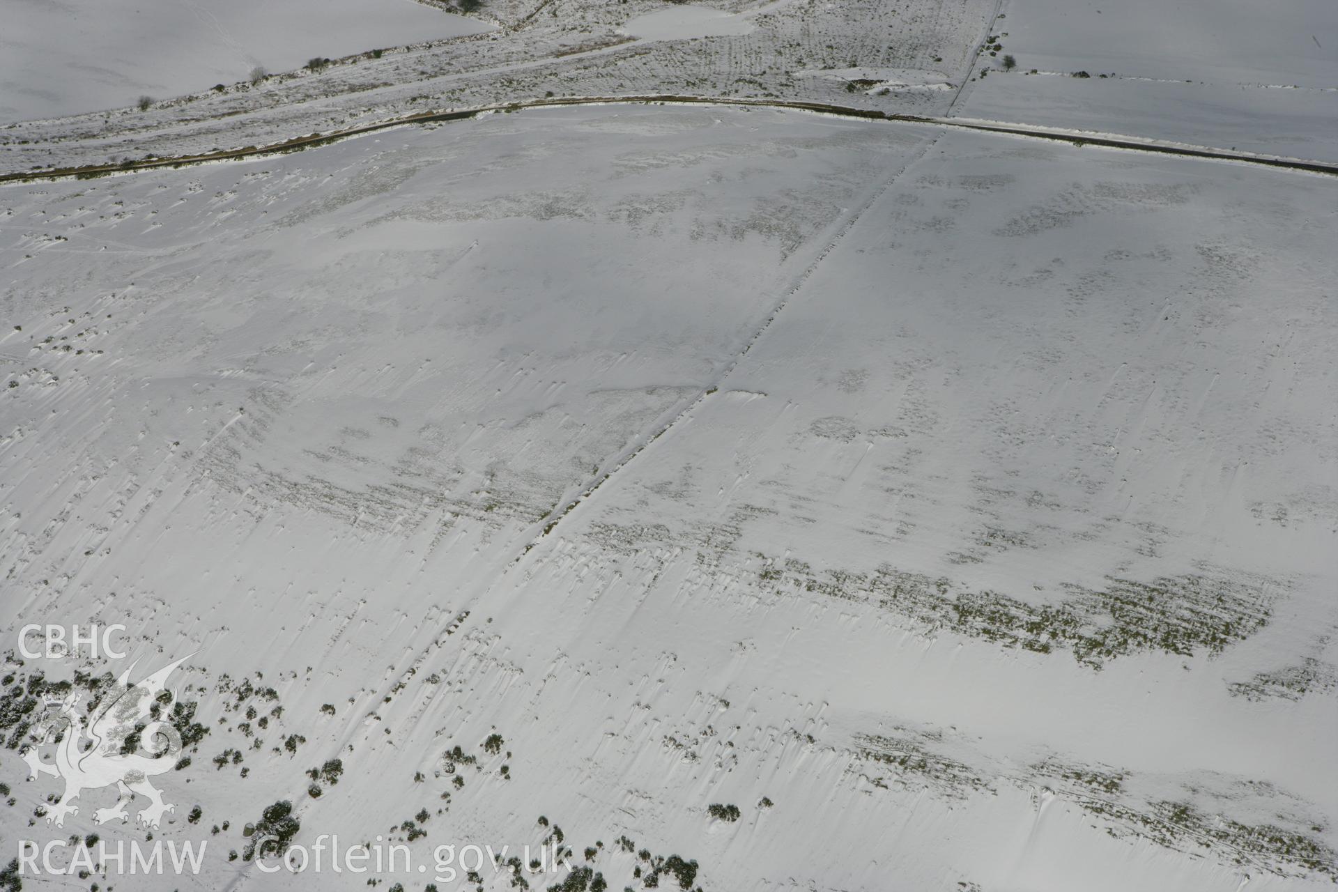 RCAHMW colour oblique photograph of Castell, Mynydd Morvil. Taken by Toby Driver on 06/02/2009.