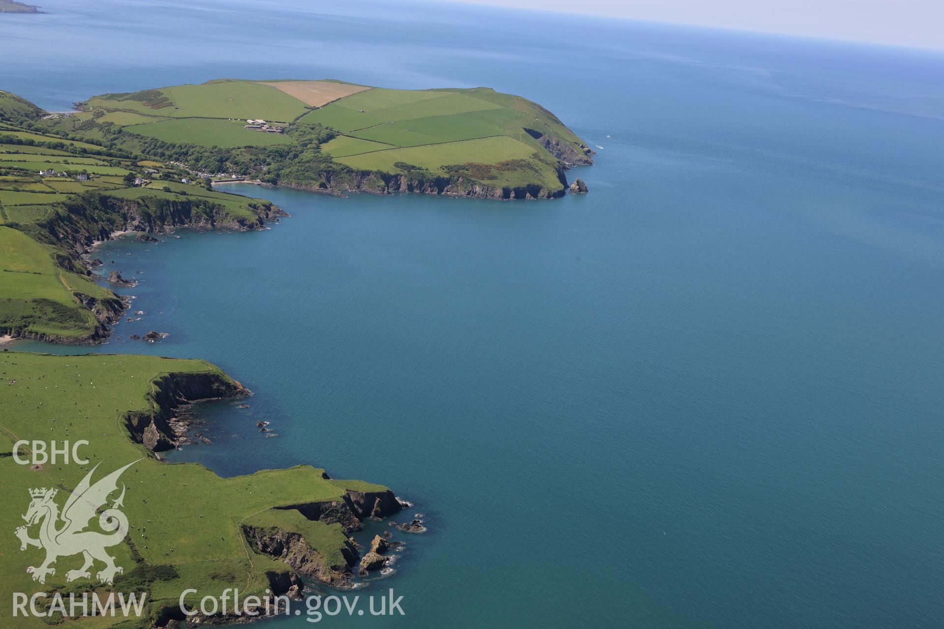 RCAHMW colour oblique aerial photograph of Cwm-Yr-Eglwys Harbour. Taken on 01 June 2009 by Toby Driver