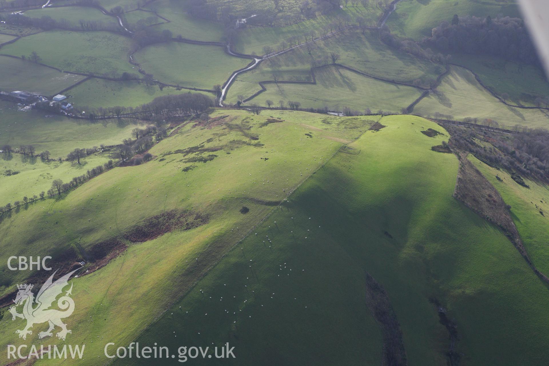 RCAHMW colour oblique aerial photograph of Coed y Gaer. Taken on 10 December 2009 by Toby Driver