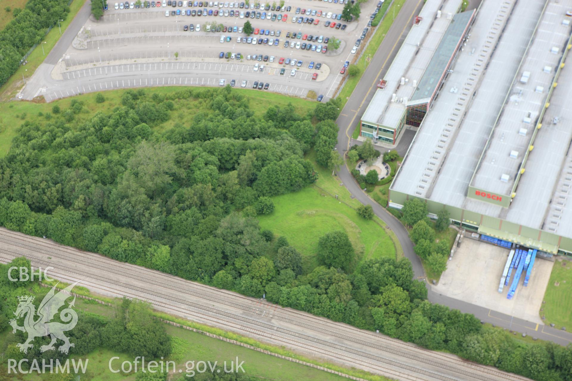 RCAHMW colour oblique aerial photograph of Felin Isaf Castle. Taken on 09 July 2009 by Toby Driver