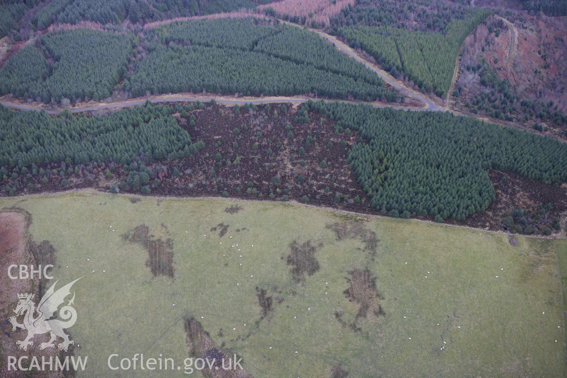 RCAHMW colour oblique aerial photograph of Llyn Dwr Cairn. Taken on 10 December 2009 by Toby Driver