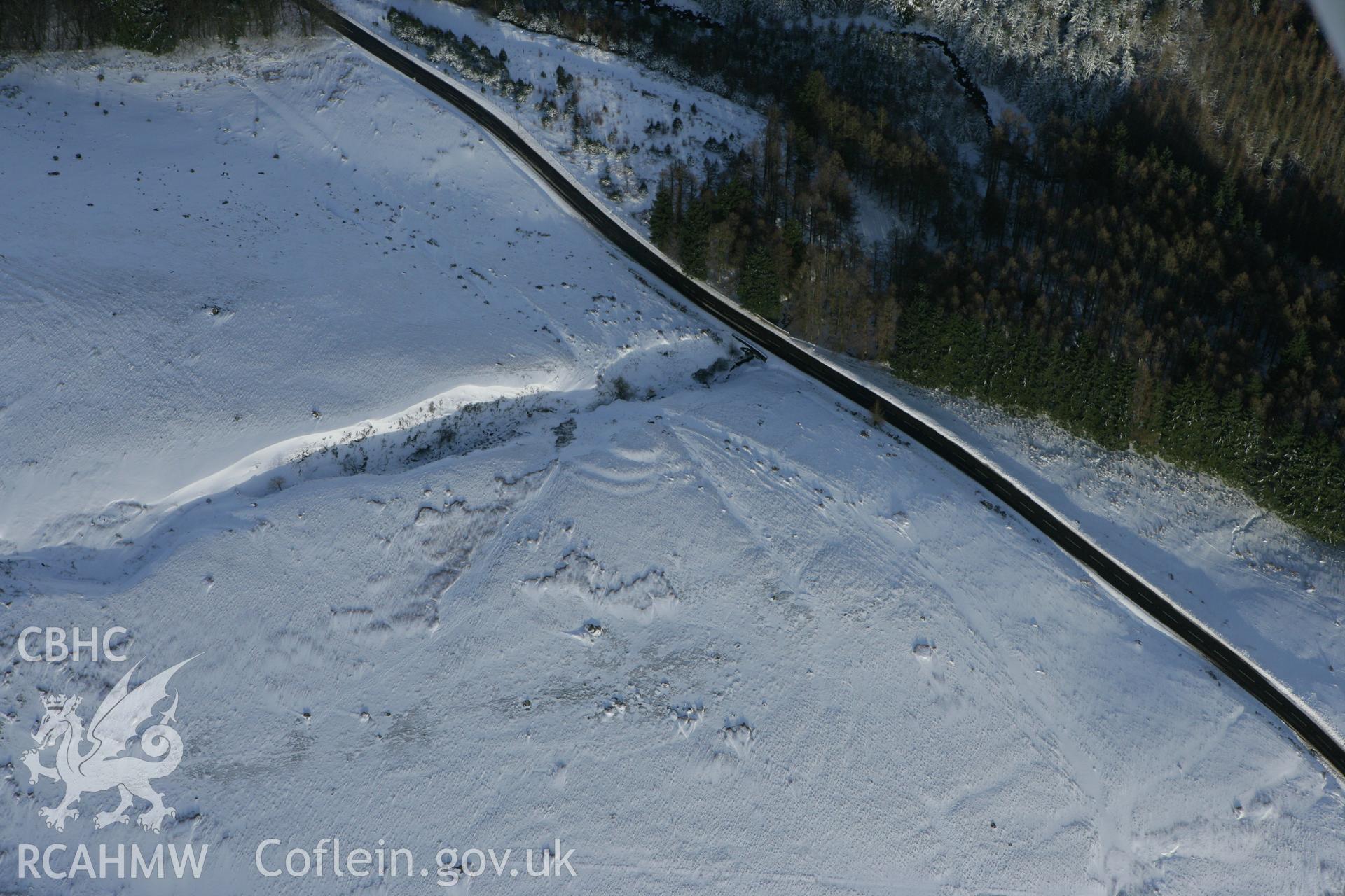 RCAHMW colour oblique photograph of Rhyd Uchaf enclosure. Taken by Toby Driver on 06/02/2009.