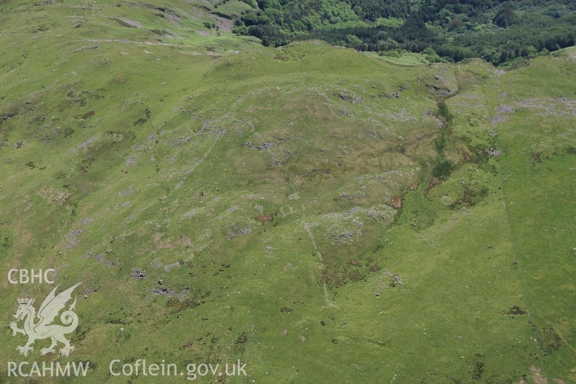 RCAHMW colour oblique aerial photograph of Craig Tyn-y-Cornel Settlement. Taken on 02 June 2009 by Toby Driver