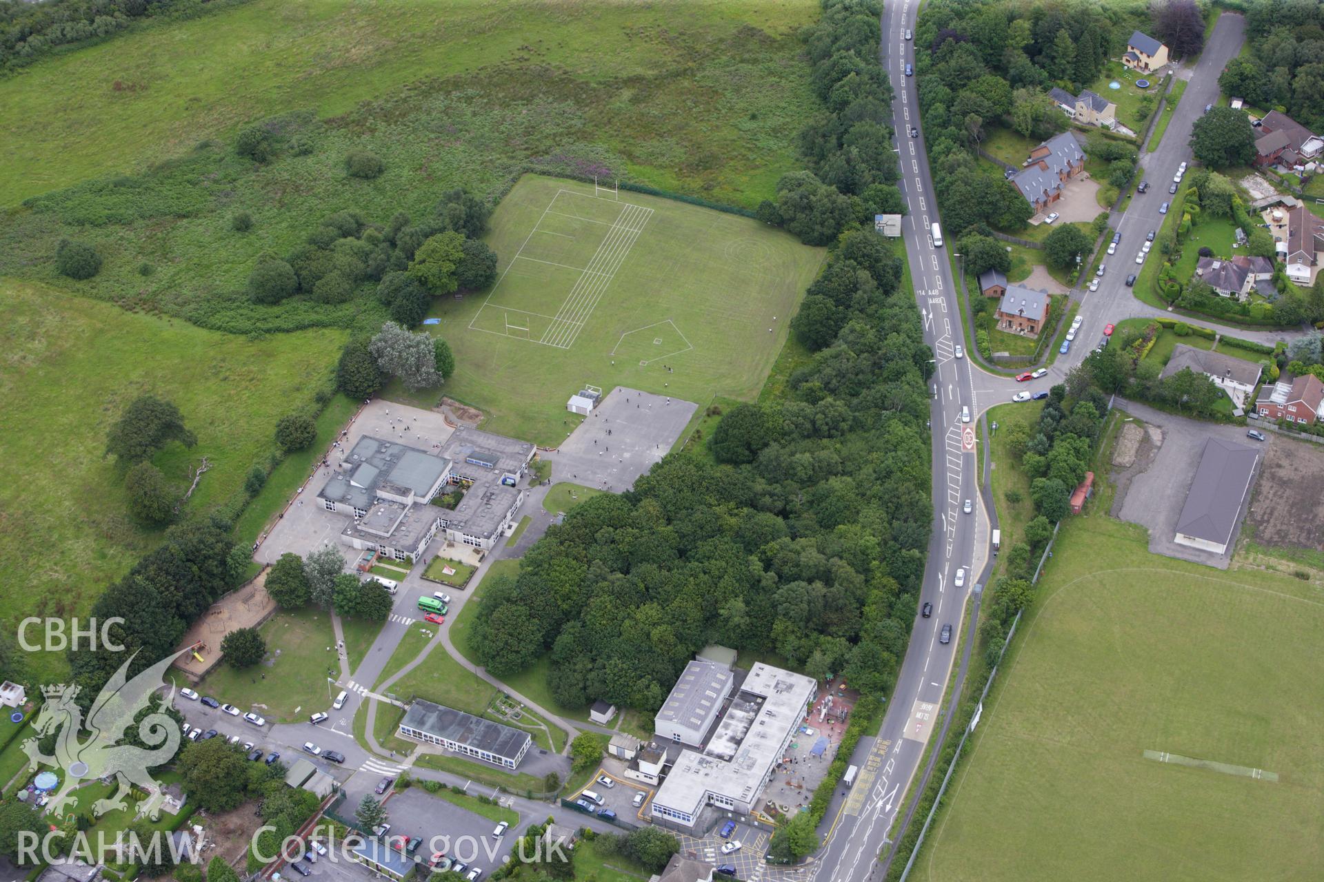 RCAHMW colour oblique aerial photograph of Penllergaer County Primary School. Taken on 09 July 2009 by Toby Driver