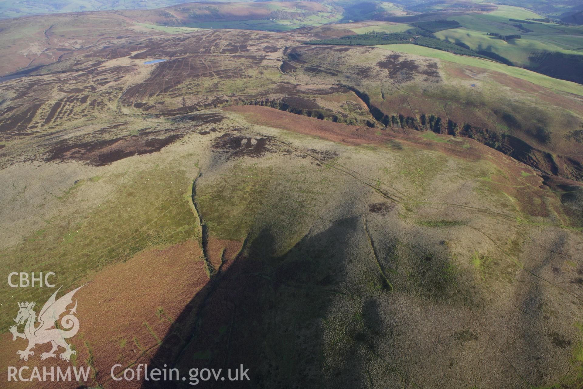 RCAHMW colour oblique aerial photograph of Rhos Crug Barrow III. Taken on 10 December 2009 by Toby Driver