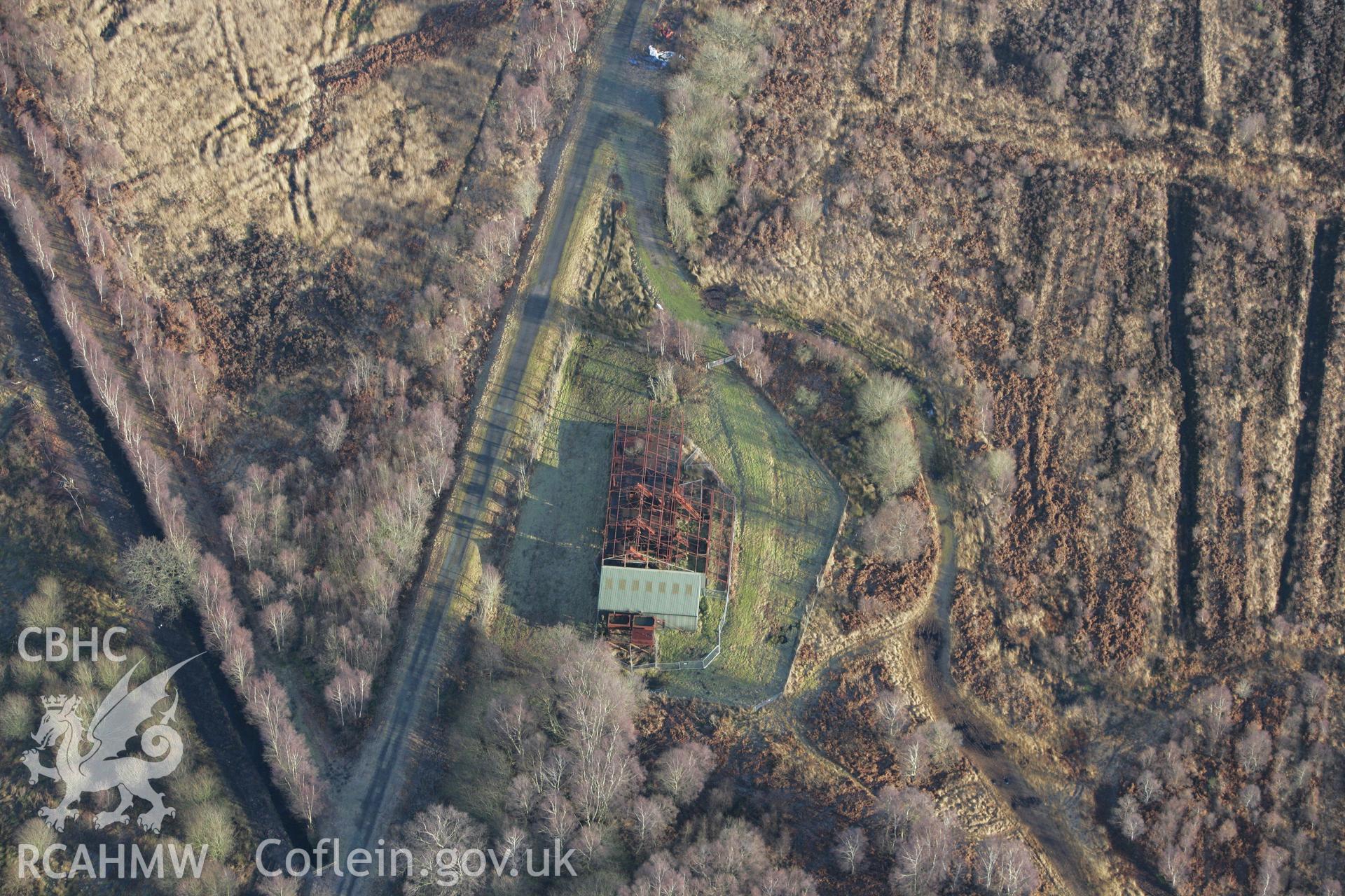 RCAHMW colour oblique photograph of Peat Processing works, Fenn's Moss. Taken by Toby Driver on 21/01/2009.