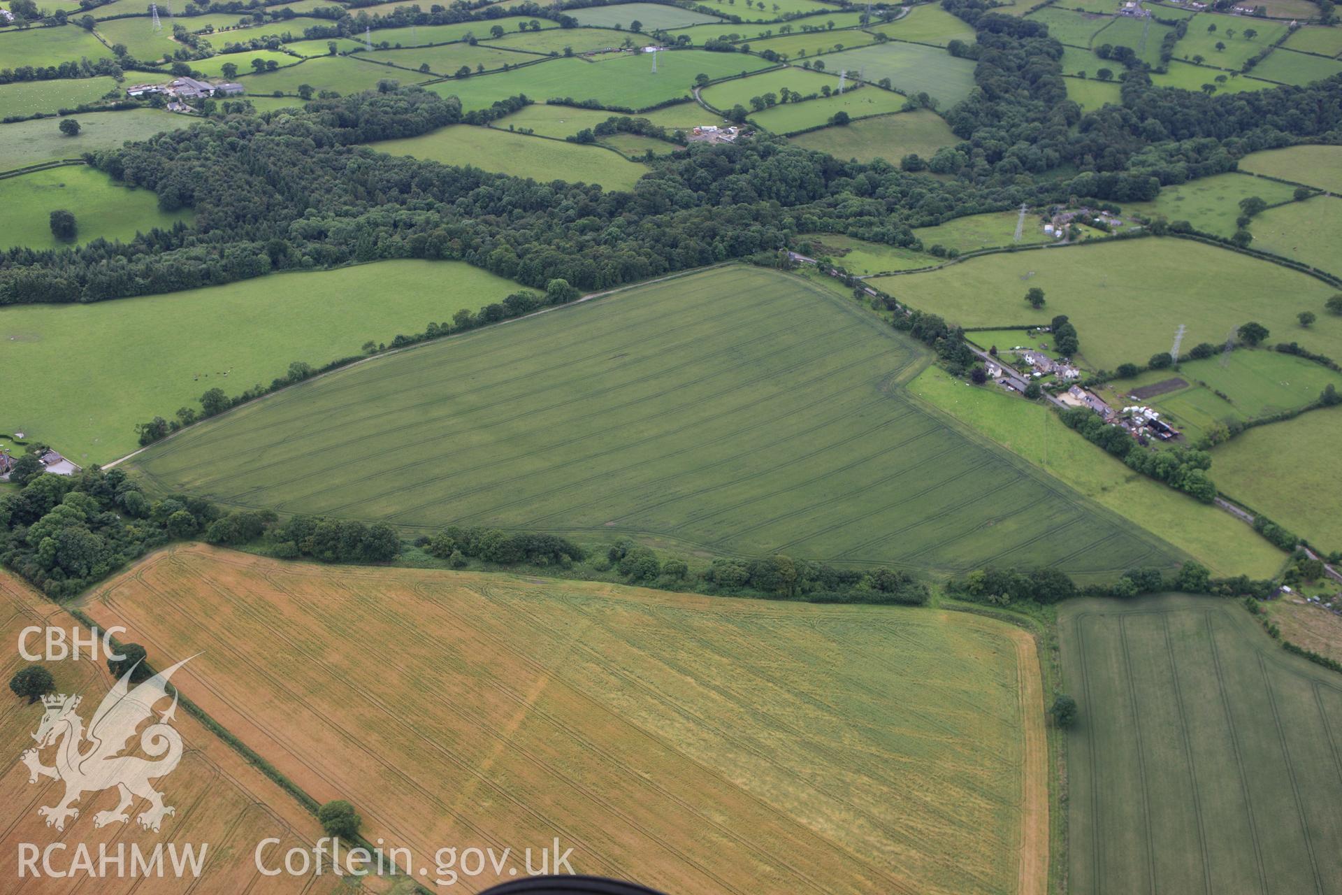 RCAHMW colour oblique aerial photograph of a section of Offa's Dyke in Plas Power Park. Taken on 08 July 2009 by Toby Driver