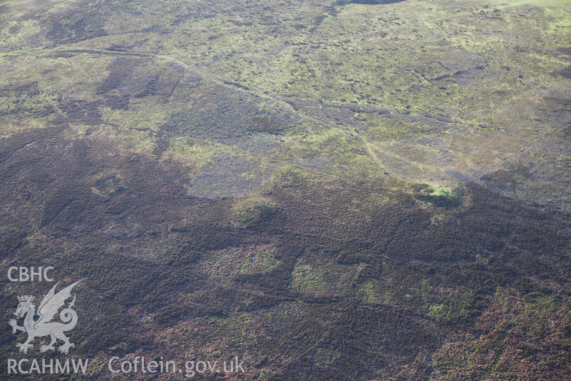 RCAHMW colour oblique aerial photograph of Beacon Hill Barrow II. Taken on 10 December 2009 by Toby Driver