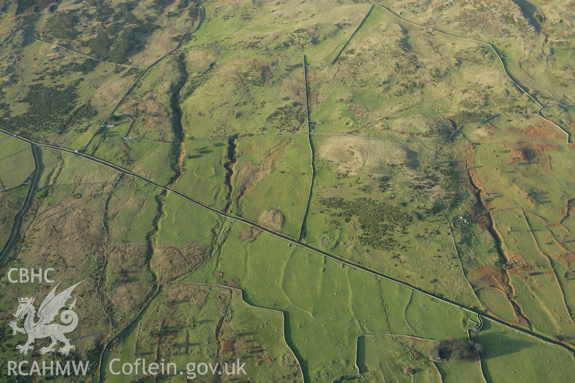 RCAHMW colour oblique aerial photograph of a homestead near Maen-y-Bardd. Taken on 10 December 2009 by Toby Driver