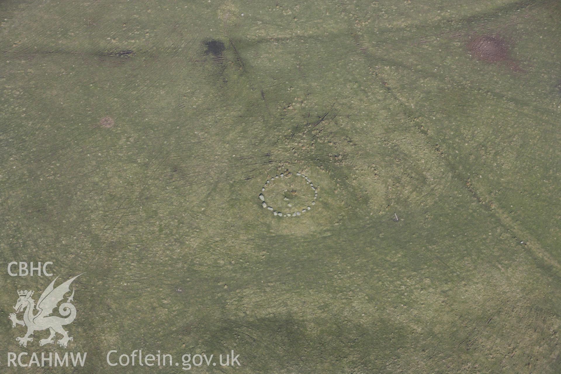 RCAHMW colour oblique photograph of Waun Dafad cairn. Taken by Toby Driver on 18/03/2009.