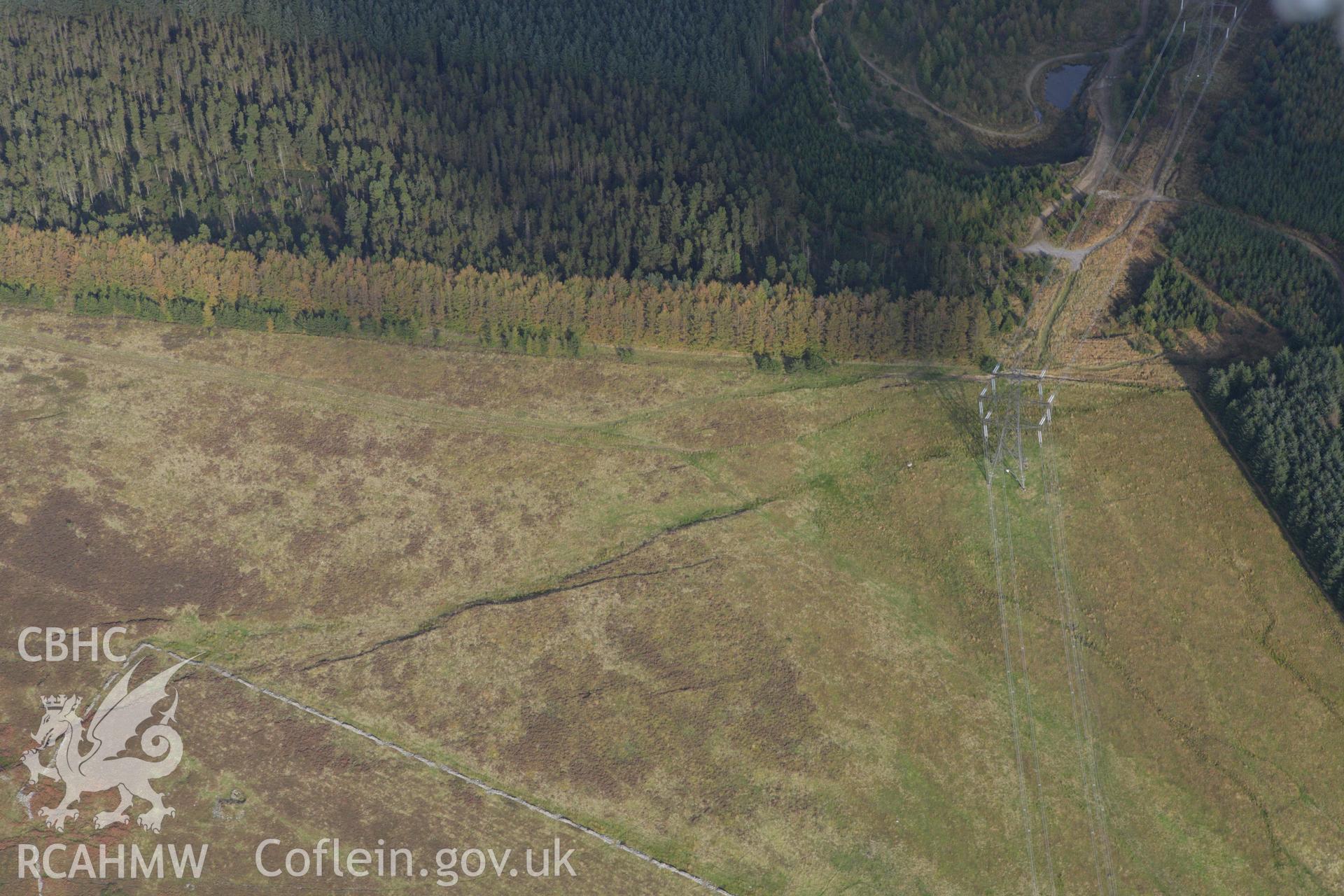 RCAHMW colour oblique aerial photograph of Twyn Blaenant Ring Cairn. Taken on 14 October 2009 by Toby Driver