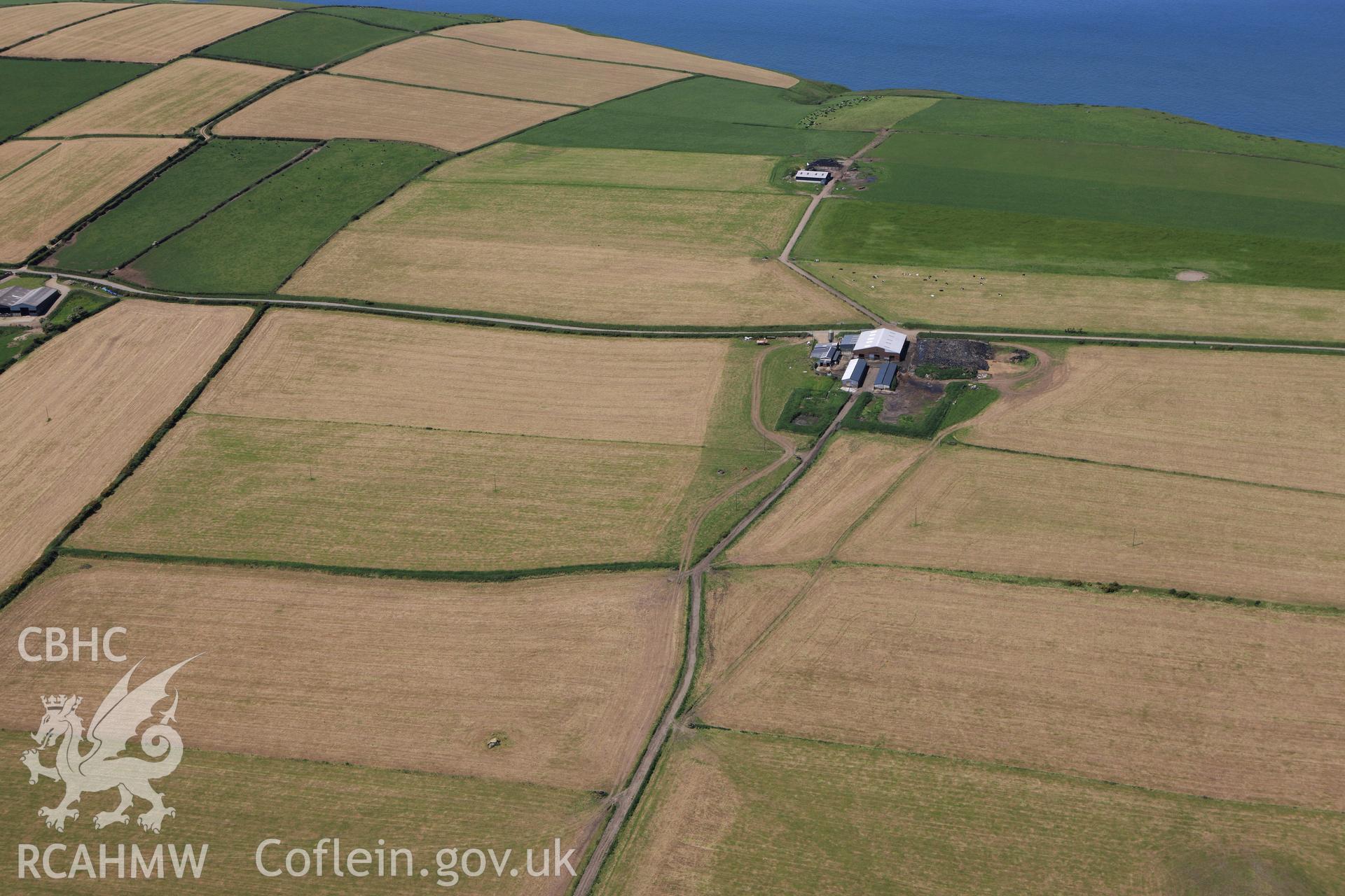 RCAHMW colour oblique aerial photograph of Trellyffaint Burial Chamber. Taken on 01 June 2009 by Toby Driver