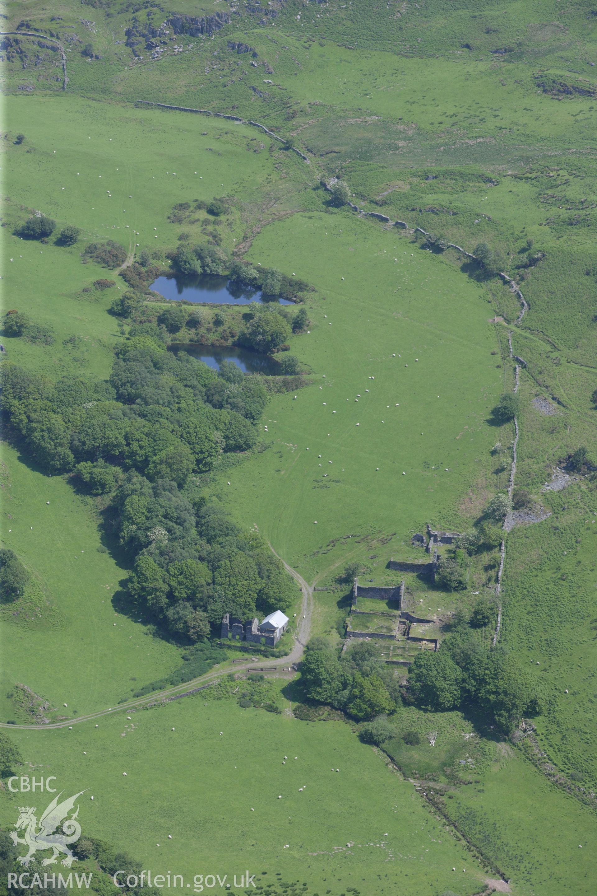 RCAHMW colour oblique aerial photograph of Bryndyfi Lead Mine, Eglwysfach. Taken on 02 June 2009 by Toby Driver