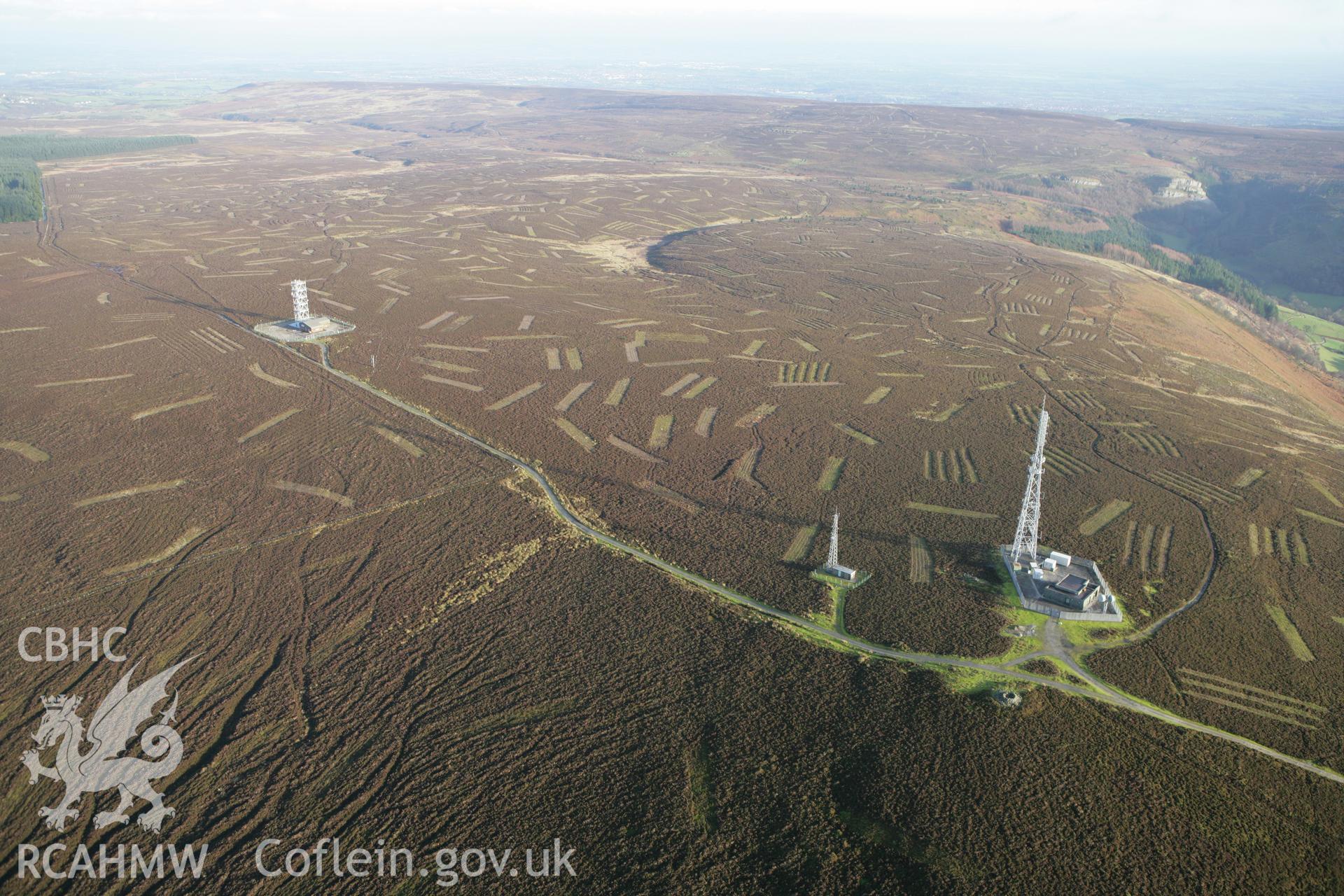 RCAHMW colour oblique aerial photograph of Cryn-y-Brain Cairn II and Wireless Station Cairn II. Taken on 10 December 2009 by Toby Driver