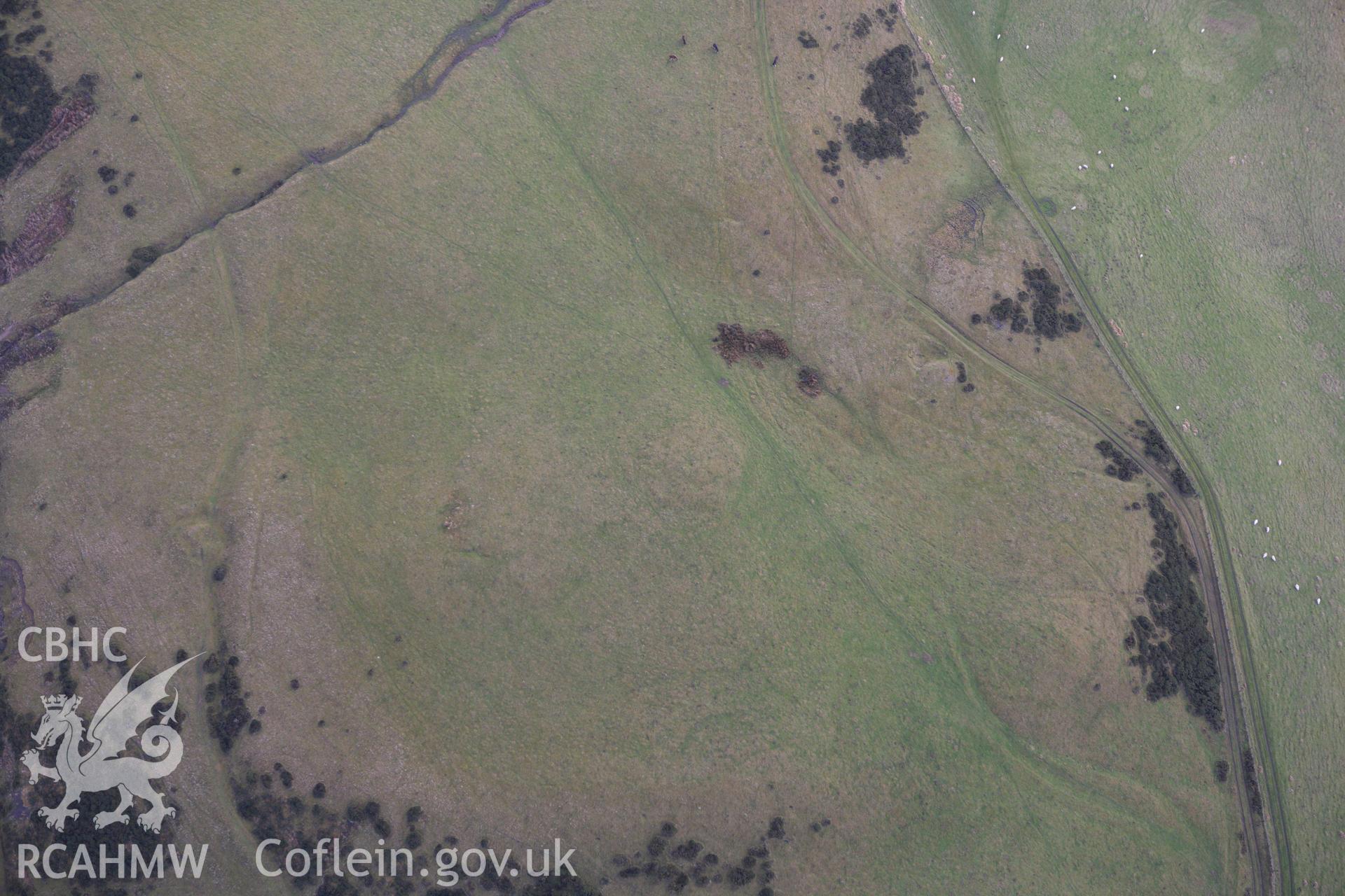 RCAHMW colour oblique aerial photograph of Crugyn-Llwyd Cairn. Taken on 10 December 2009 by Toby Driver