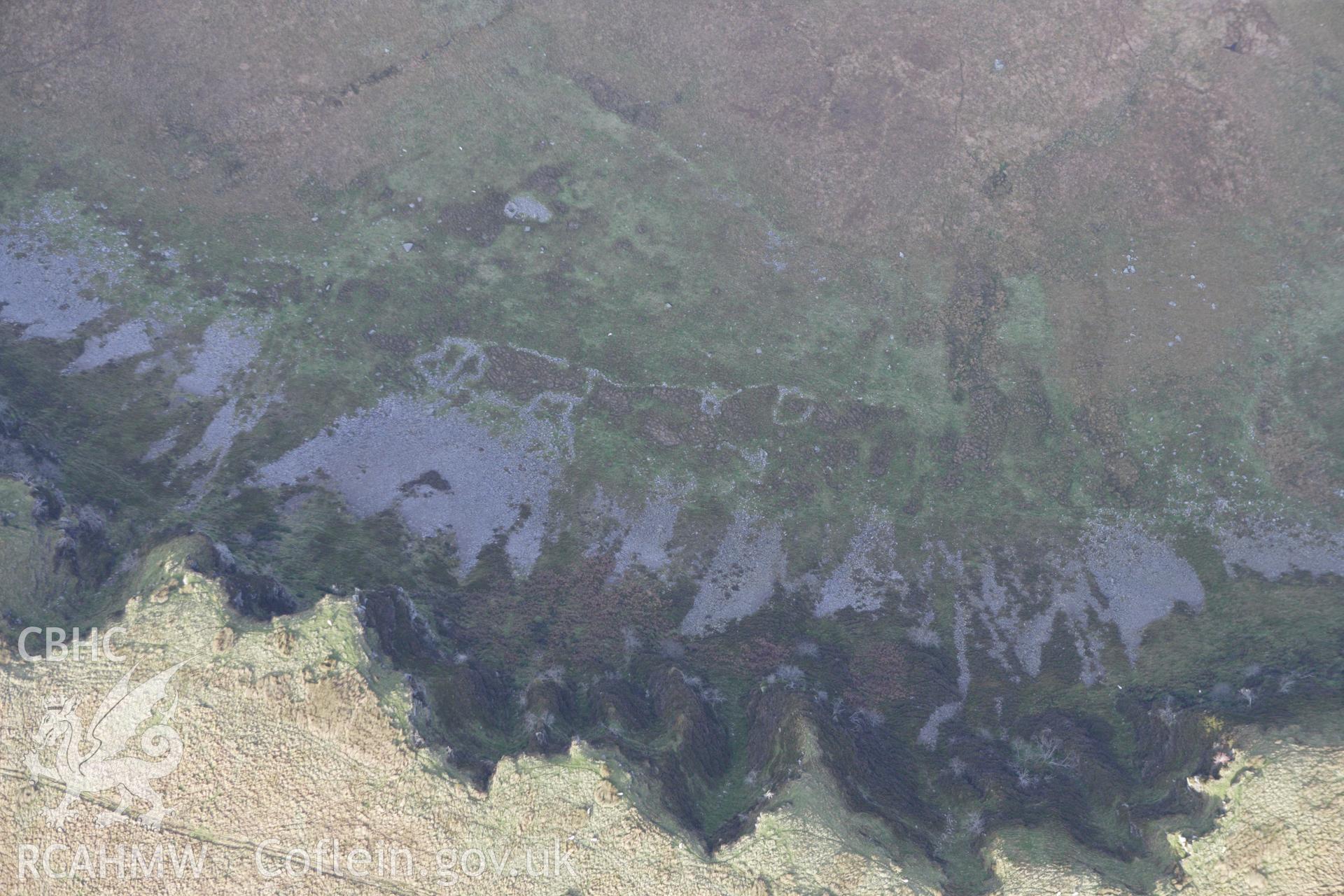 RCAHMW colour oblique aerial photograph of Padell-y-Bwlch Hut Settlement and Enclosures. Taken on 14 October 2009 by Toby Driver