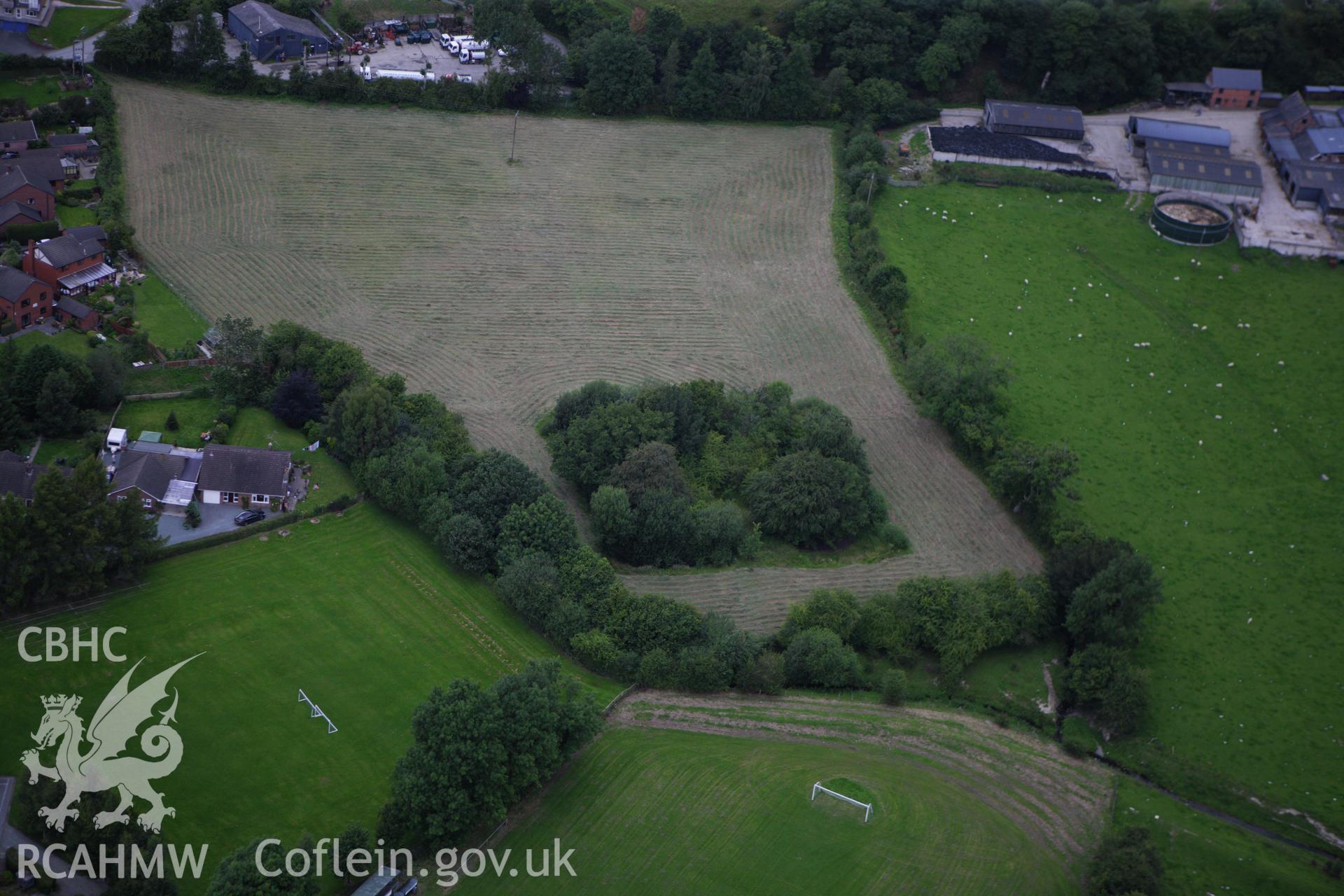 RCAHMW colour oblique aerial photograph of Cwrt-y-Person Moat. Taken on 06 August 2009 by Toby Driver