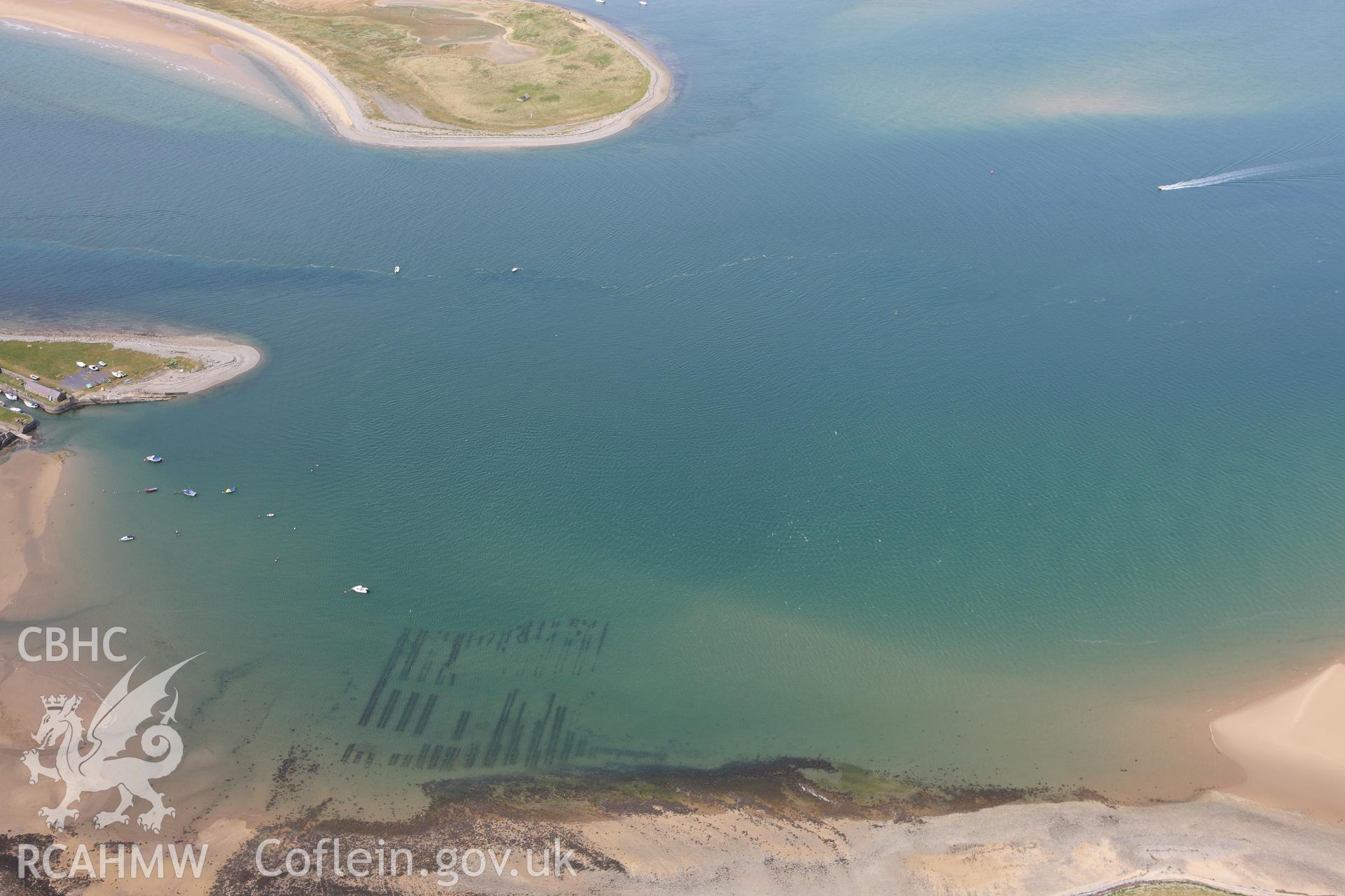 RCAHMW colour oblique aerial photograph of Oyster Beds, to the east of Fort Belan. Taken on 16 June 2009 by Toby Driver